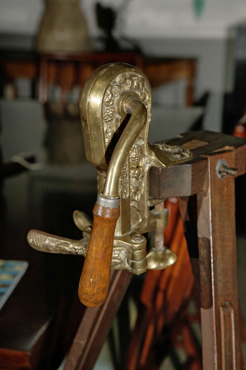 antique wine opener with stand