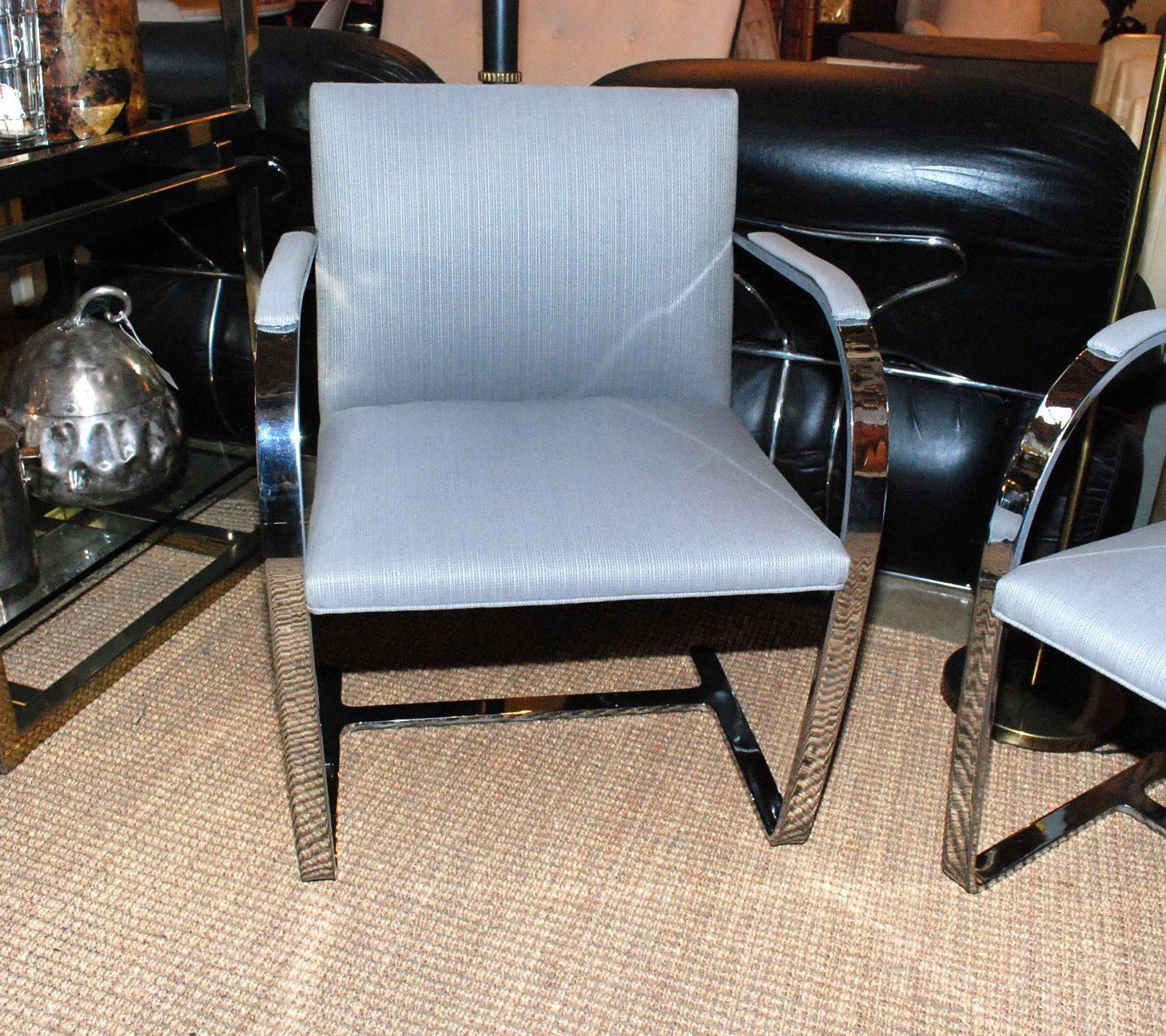 A wonderful pair of vintage Brno chairs by Mies van der Rohe. Made of chrome-plated metal and newly upholstered with light blue fabric.