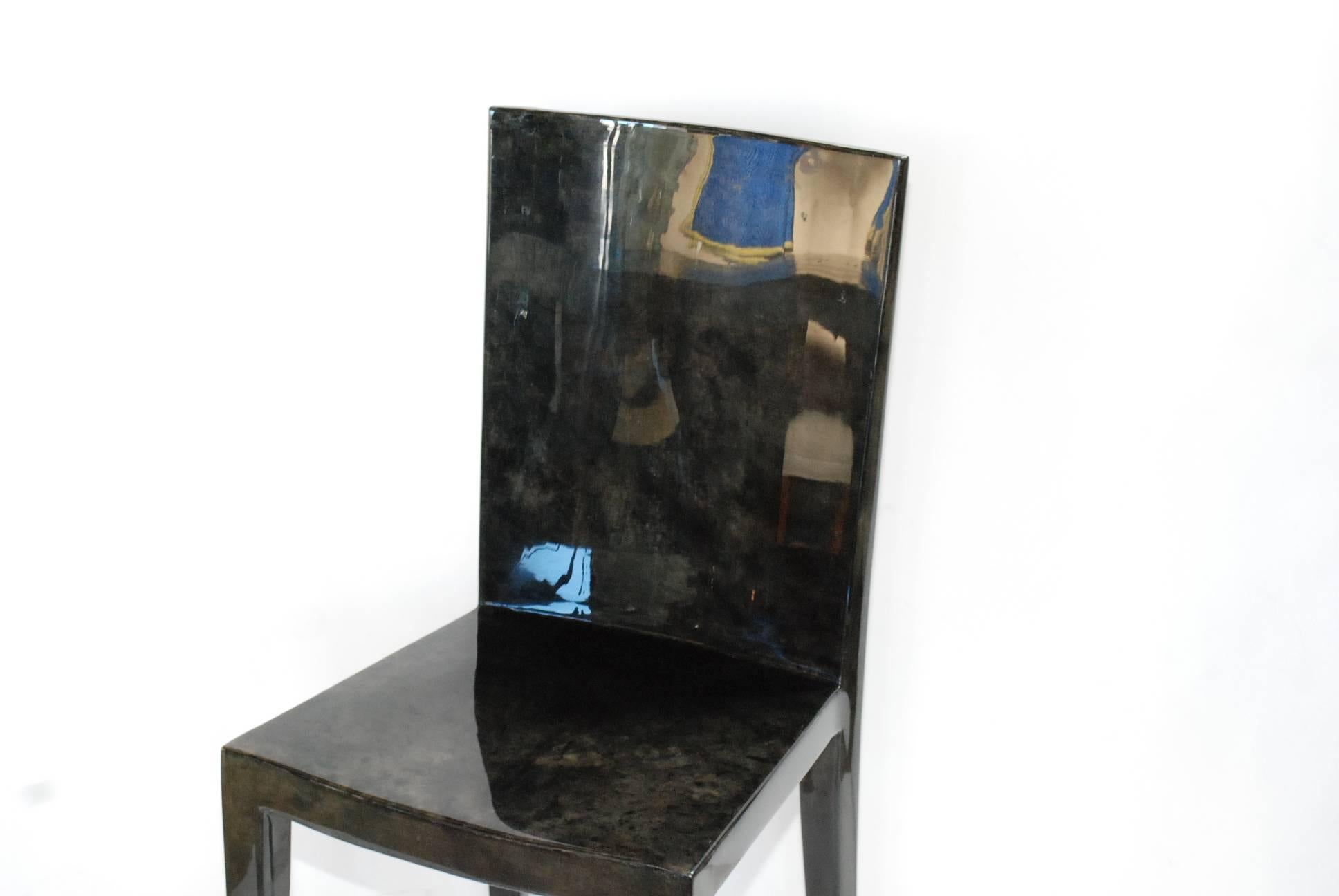 Single side chair cover with dark green grey parchment in the style of Karl Springer. (High gloss polyester resin filled finish).
Please note: Mark on resin top side chair see last detail picture.