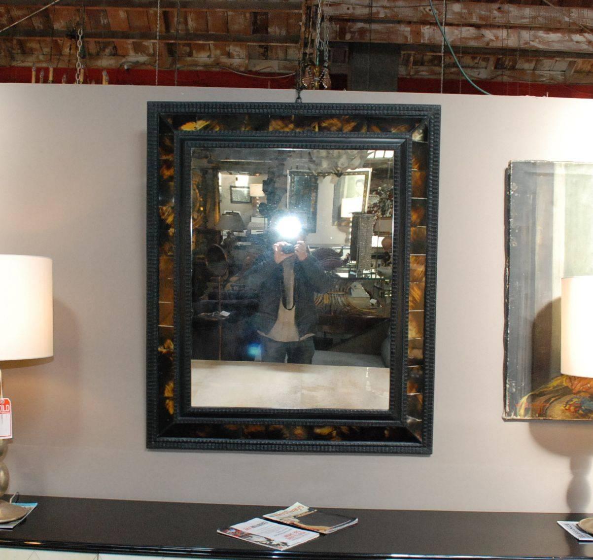 Elegant large antique finish mirror cover with Horn and black lacquer finish. Please Note: Minor crack on resin.
  