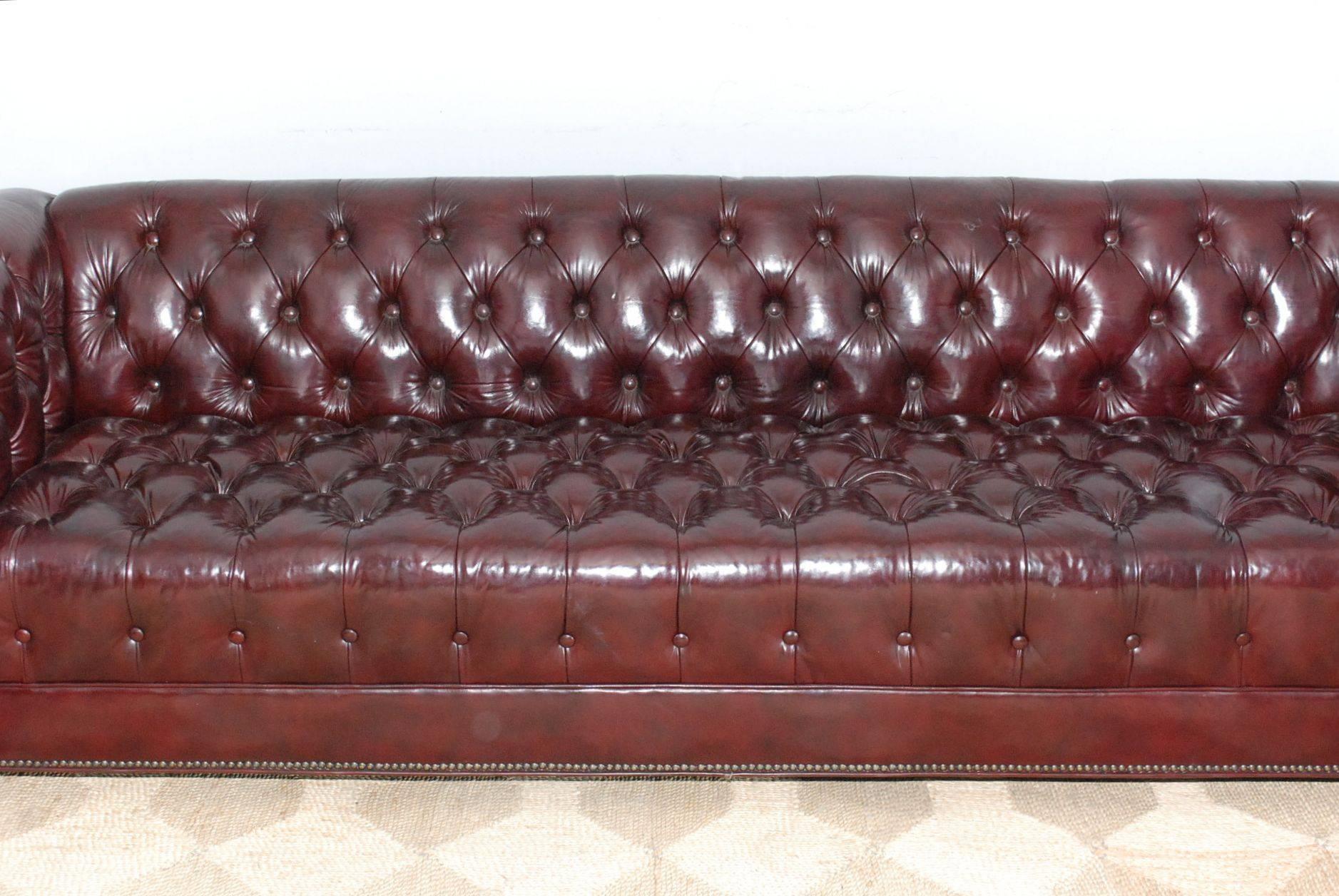 Large leather tufted chesterfield sofa.