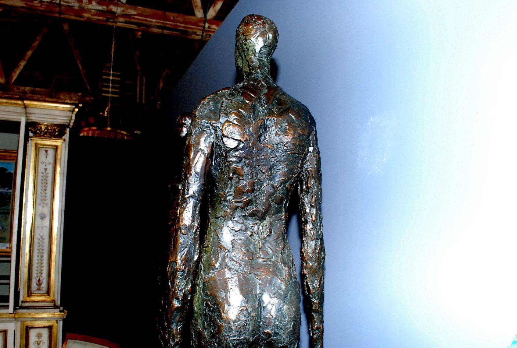 American Tall Bronze Man and Woman Sculptures by Tom Corbin