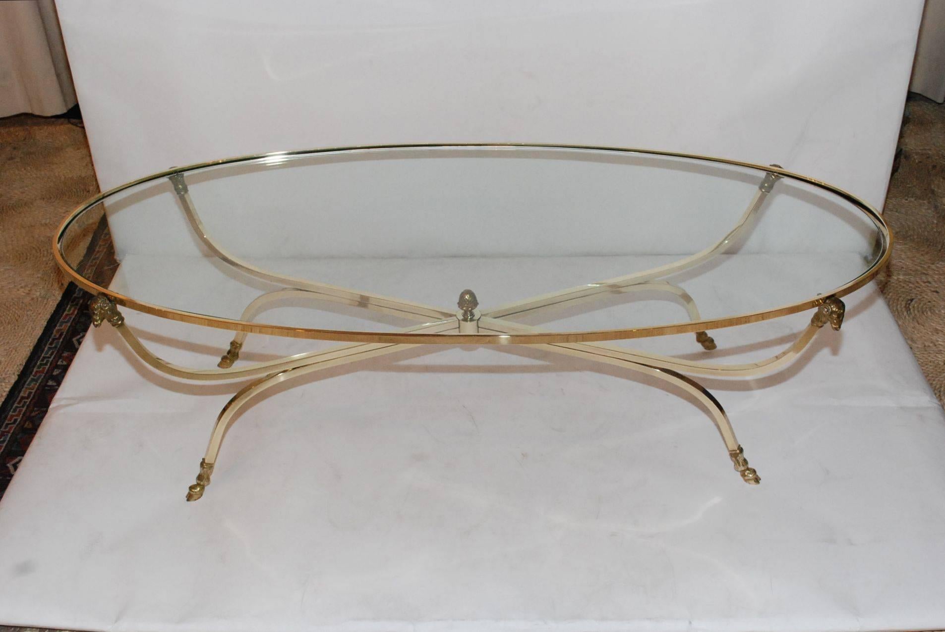 Elegant Brass 1970s Italian oval ram's head coffee table with glass top.
