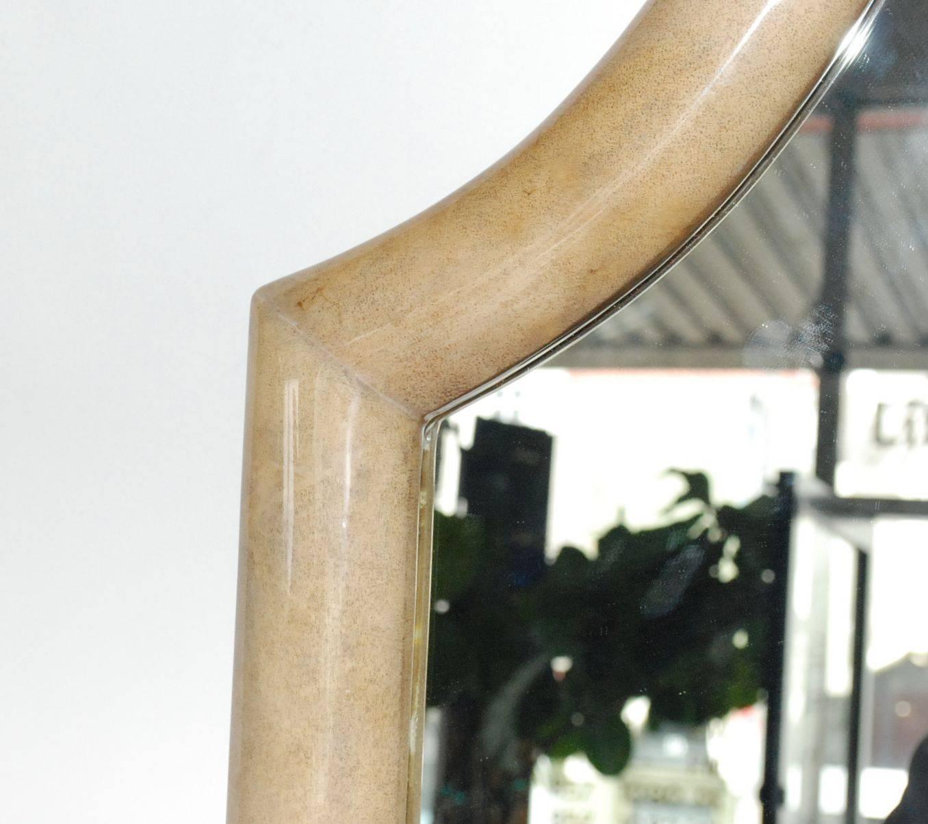 Elegant mirror cover with natural goatskin. (High gloss polyester resin filled finish).