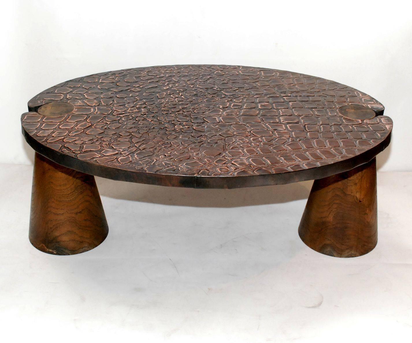 Solid wood legs coffee table with turtle copper design top.