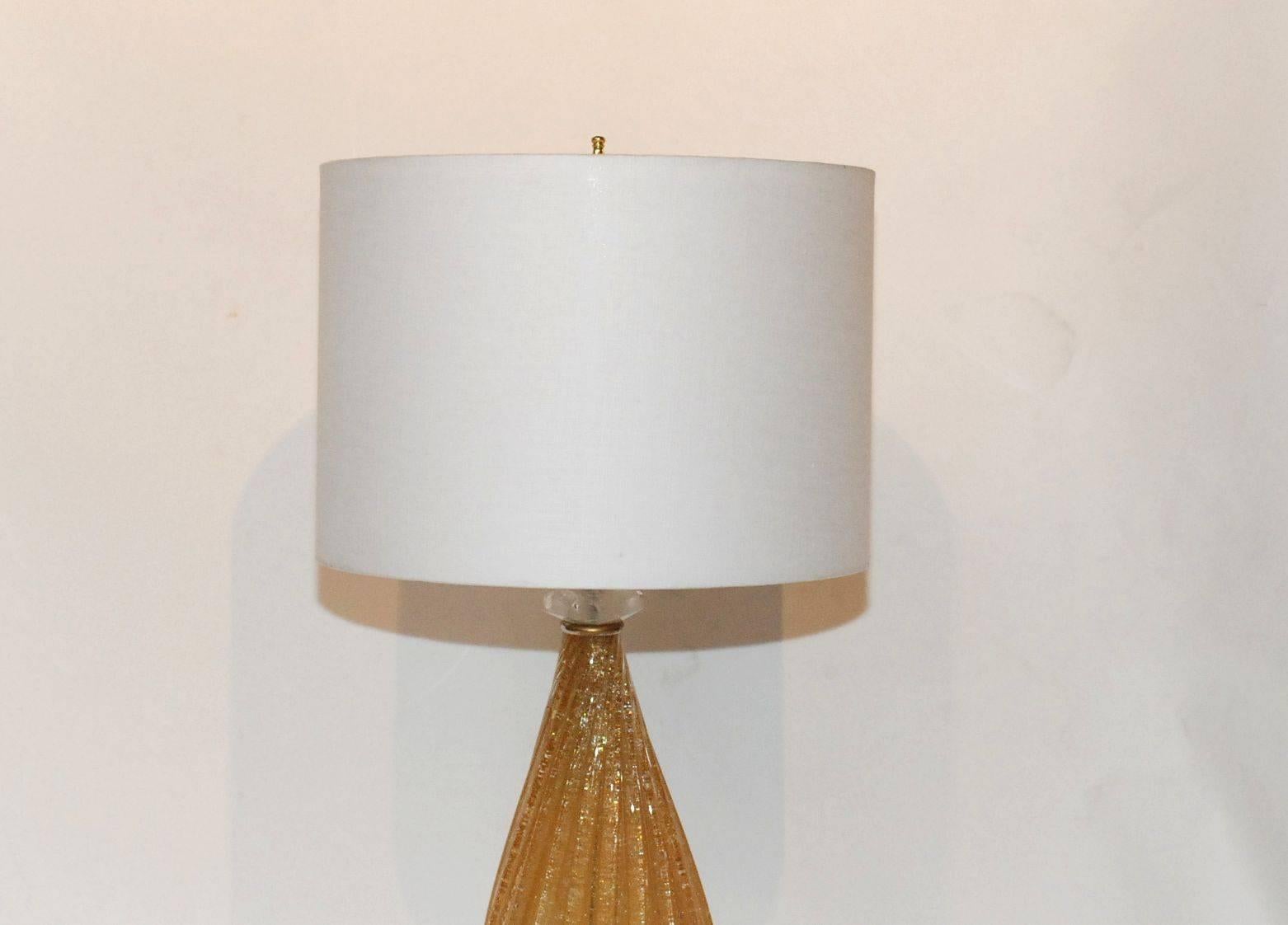 Elegant yellow Murano glass lamp with rock crystal base and detail.