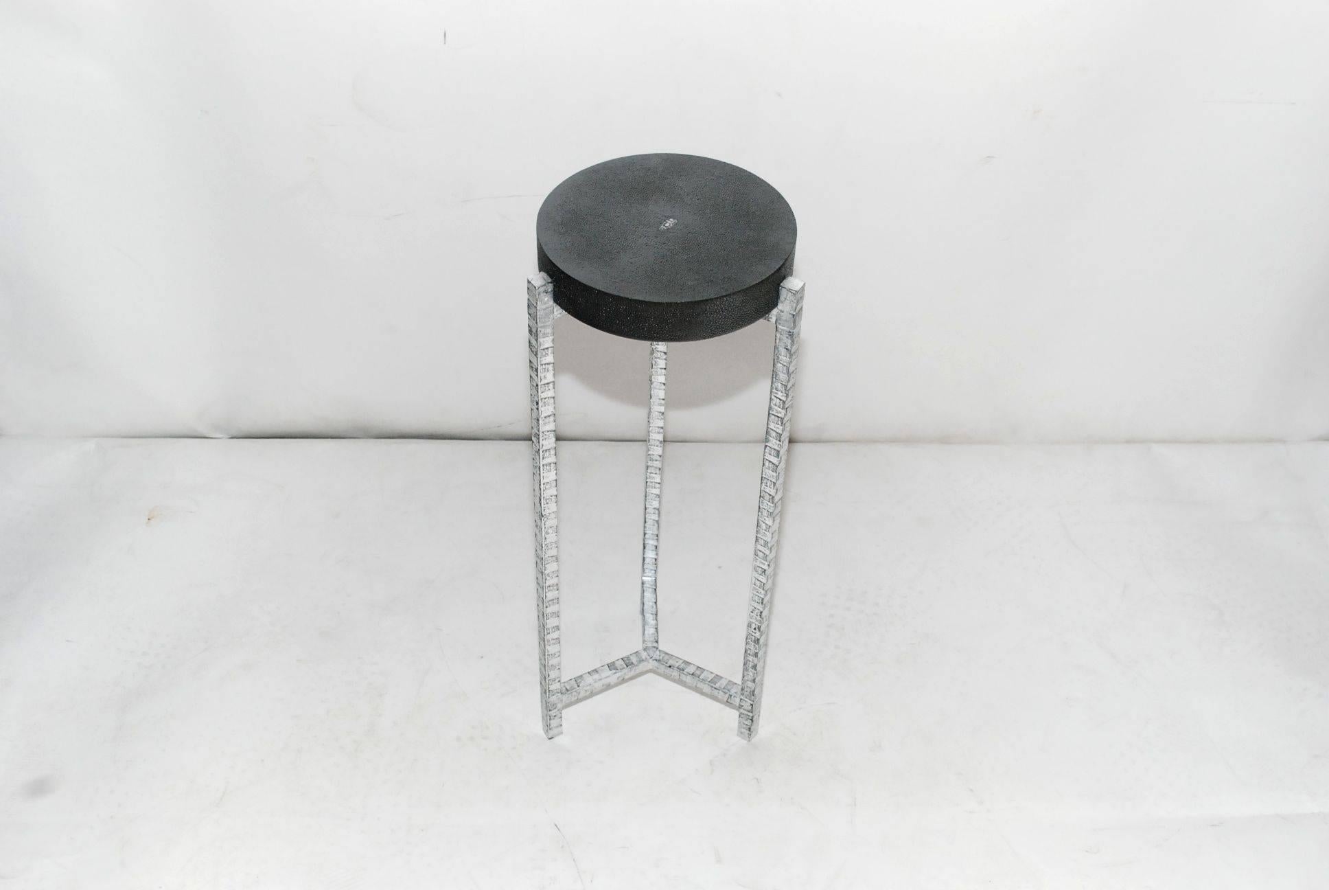 Pair of side or drinks tables cover with black shagreen and silver painted on iron base.