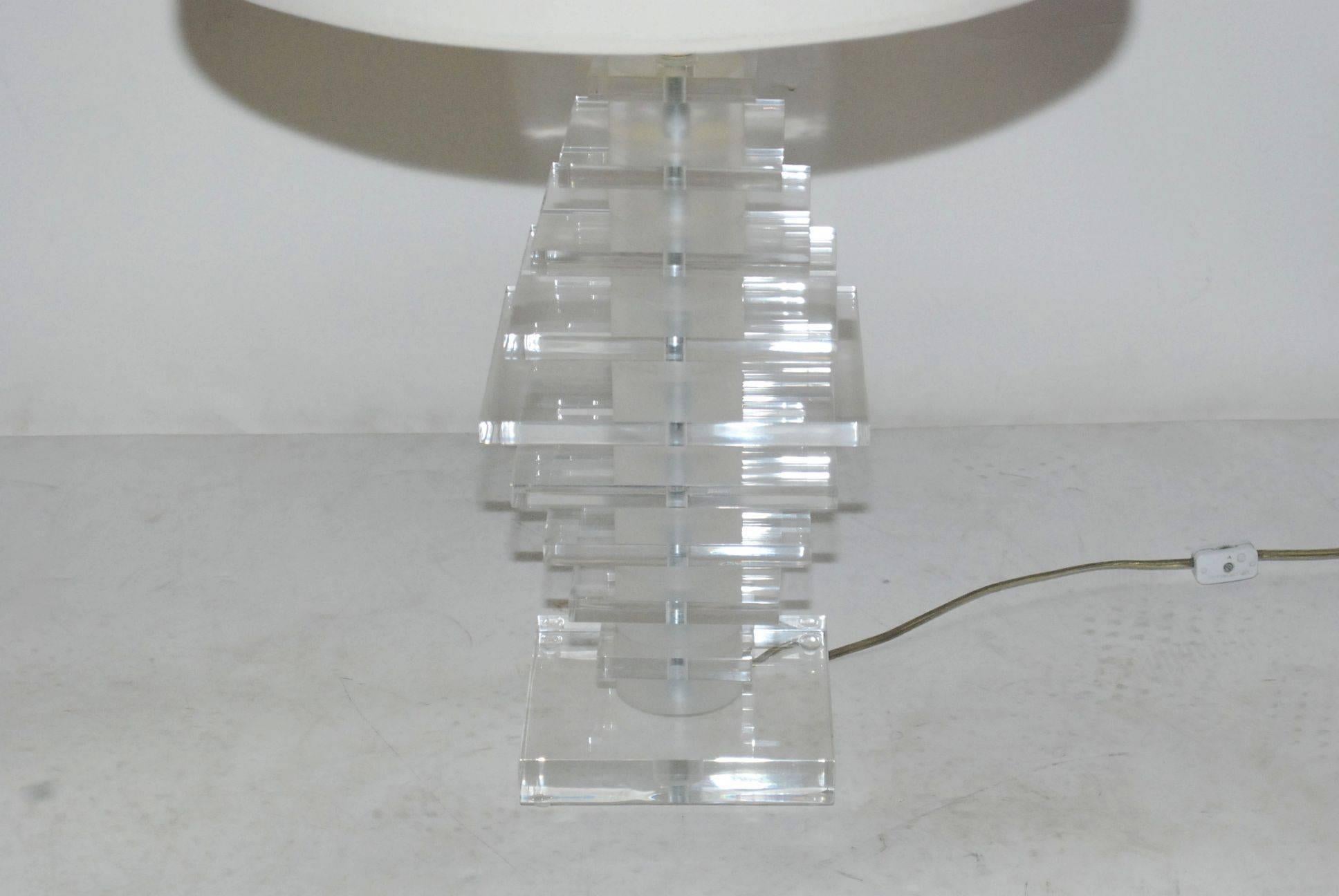 Pair of stacking Lucite square table lamps.
Please note: Shades need to be replace original.