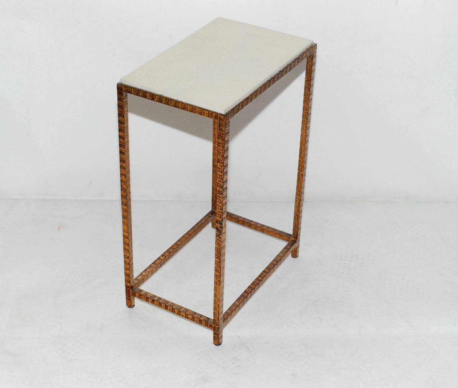 Pair of iron with copper finish side tables cover with white shagreen top.