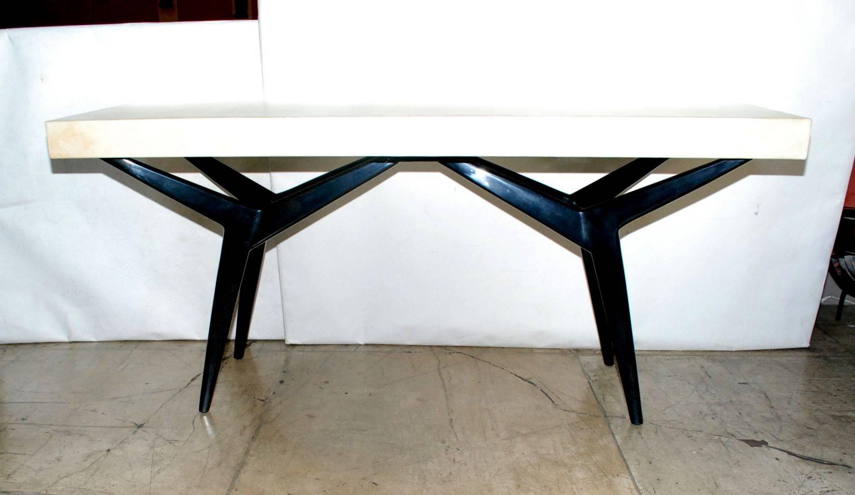 Elegant sculptural black resin and lacquer finish console table cover with parchment top.