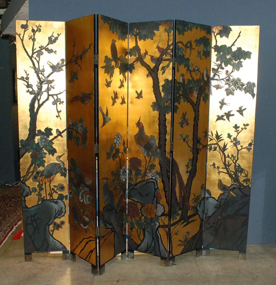 Colorful black and gold lacquered coromandel screen. Each panel measure W 16