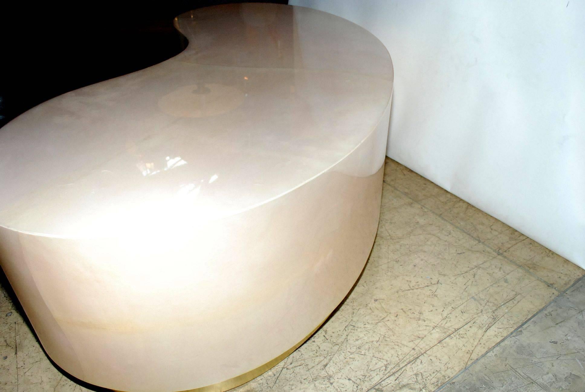 American Parchment Kidney Shape Coffee Table with Brass Detail