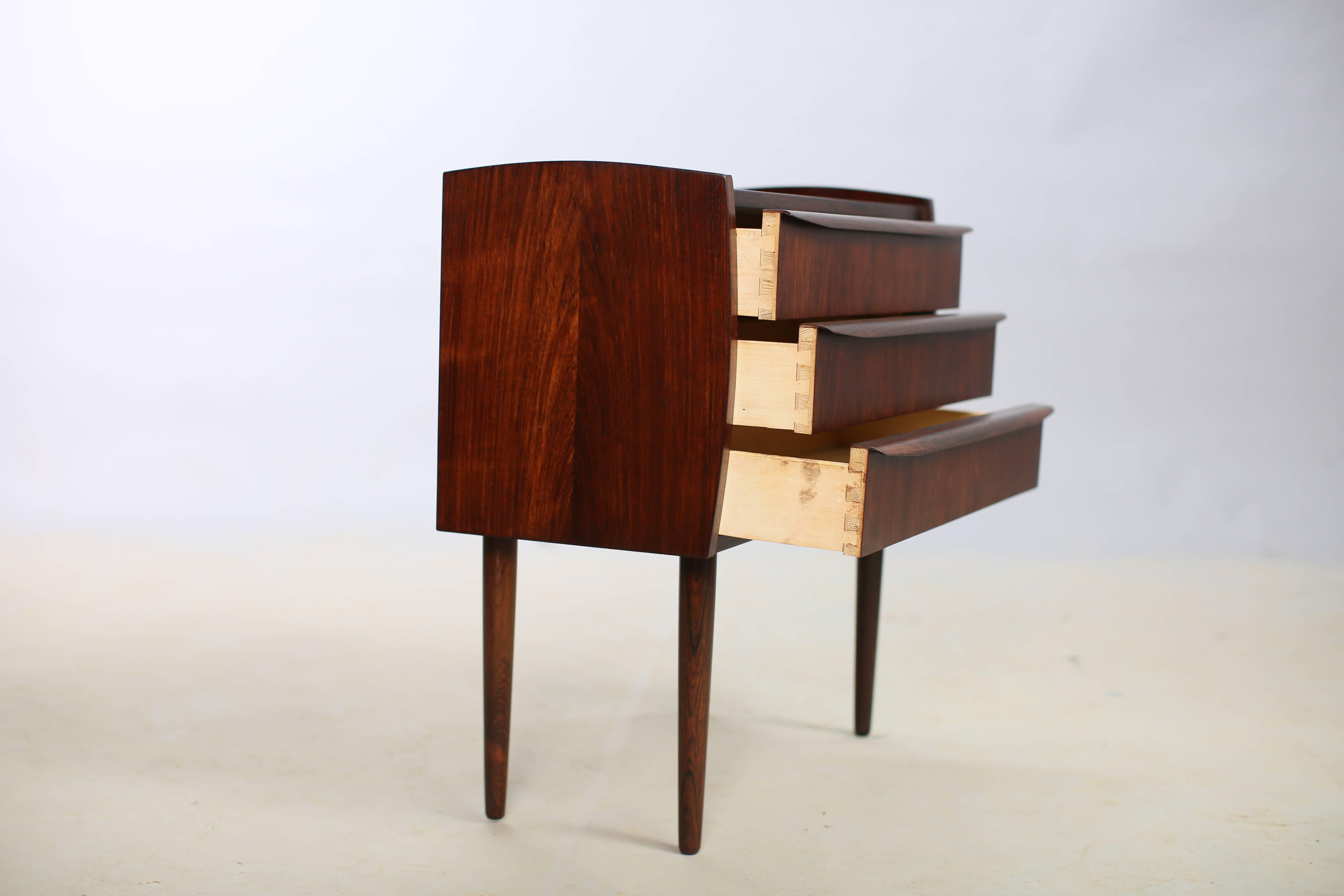 Vintage 1960s Danish Bedside Tables.

This pair of Danish nightstands is in excellent condition. Three drawers in each table give both sides of the bed a lot of storage. Ready for pick up, delivery or shipping anywhere in the world.