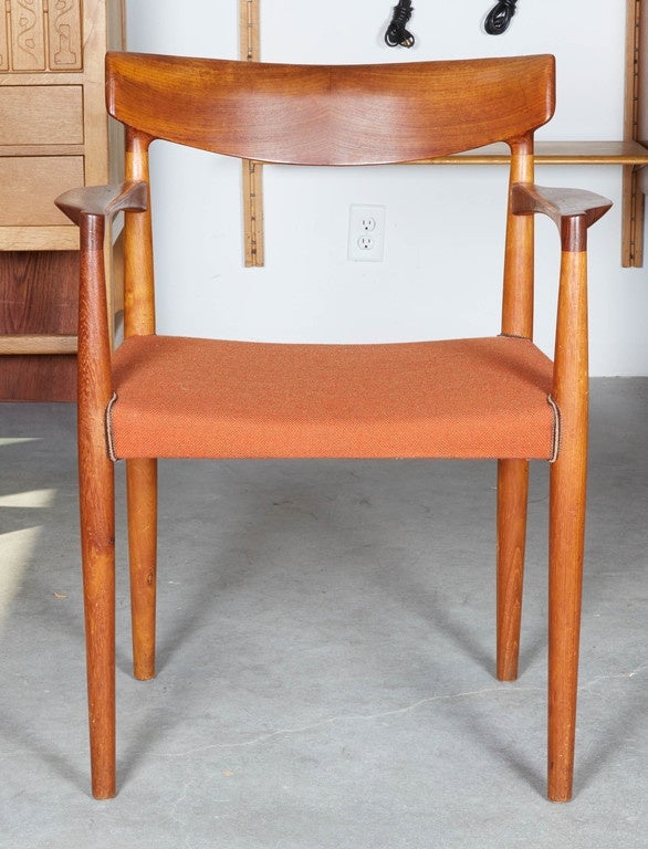 Vintage 1960s teak occasional chairs, pair
 
Dual Stain Teak Wood gives this chair the best of both hues. The contrasting stains on this chair certainly adds some character, couple this with the organic arms and conical legs and we have a winner.