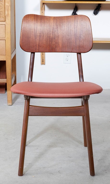 Vintage 1950s Dining Chairs by Arne Vodder, Set of Six

These dining room side chairs feature a classic Arne Vodder Design with Brass Joinery(visible from behind) and a wonderful teak frame. The upholstery can be changed to fit your style.