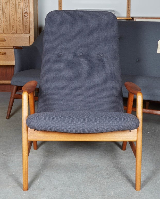 Vintage 1950s Danish Armchair 

This vintage recliner has an upright position (see images) as well as a reclining position. Simply pull the seat forward and you are ready to kick your feet up after a long day. The sleek design and versatility of