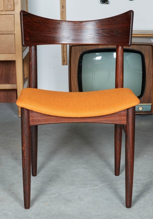 Vintage 1960s Rosewood Dining Room Side Chairs

These newly upholstered Rosewood chairs are in excellent condition. The concave back is not only appealing to the eye but makes for an extremely comfortable sit. Six Chairs available. We have a wide
