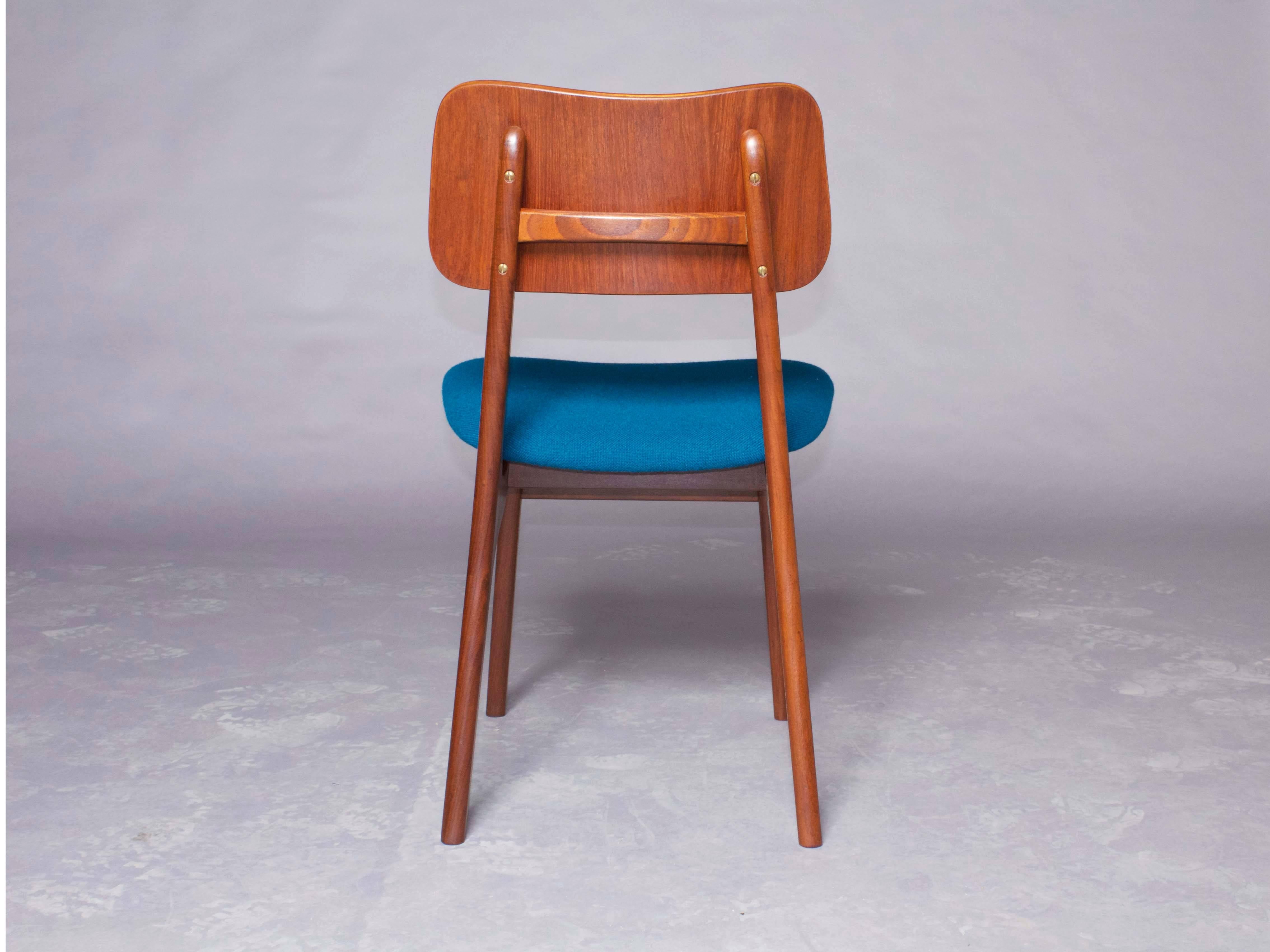 Vintage 1950s teak dining chairs from Denmark.

This set of vintage dining chairs are absolutely some of the most comfortable you will ever sit in. They have this gorgeous brass bead that connects the structure to the back of the chair. All in