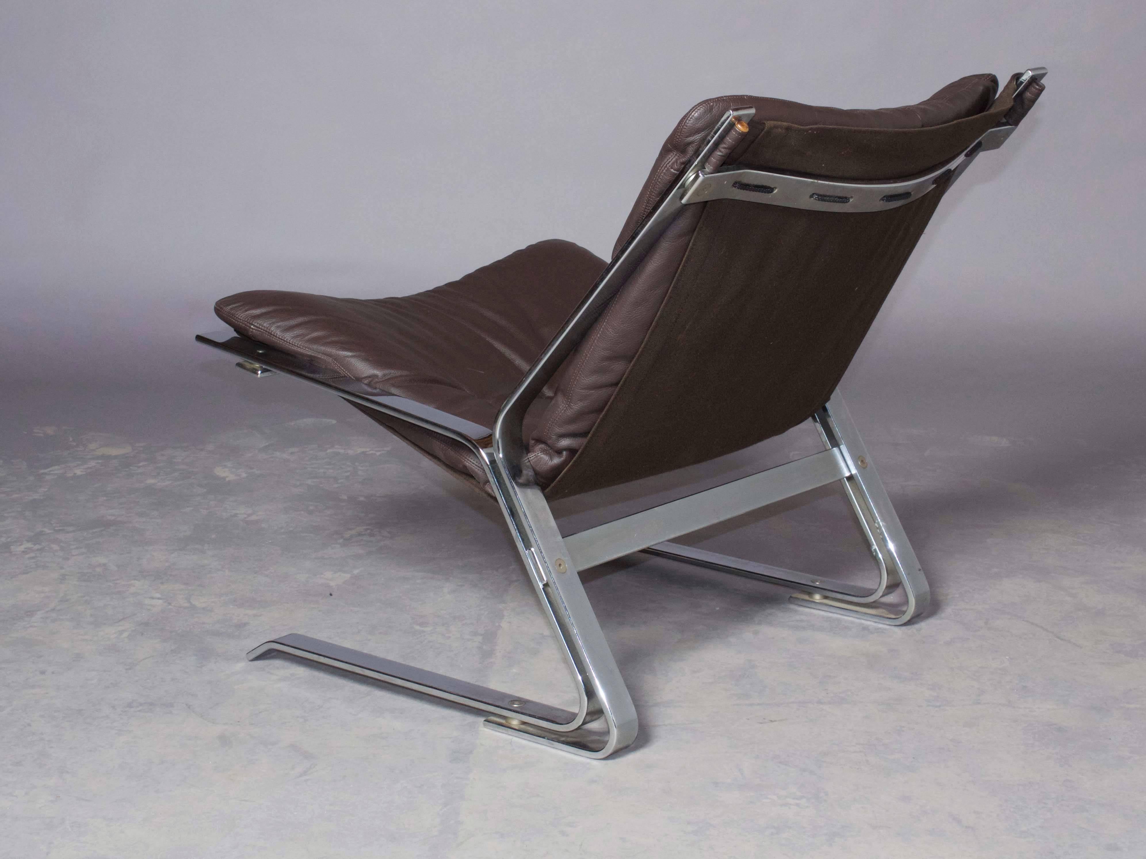 Vintage 1960s chrome and leather slipper chairs by Elsa and Nordahl Solheim

This pair of leather lounge chairs, the model Pirate, with chromed steel bases, stretched with canvas, loose seat cushions upholstered in buttoned leather. Designed in
