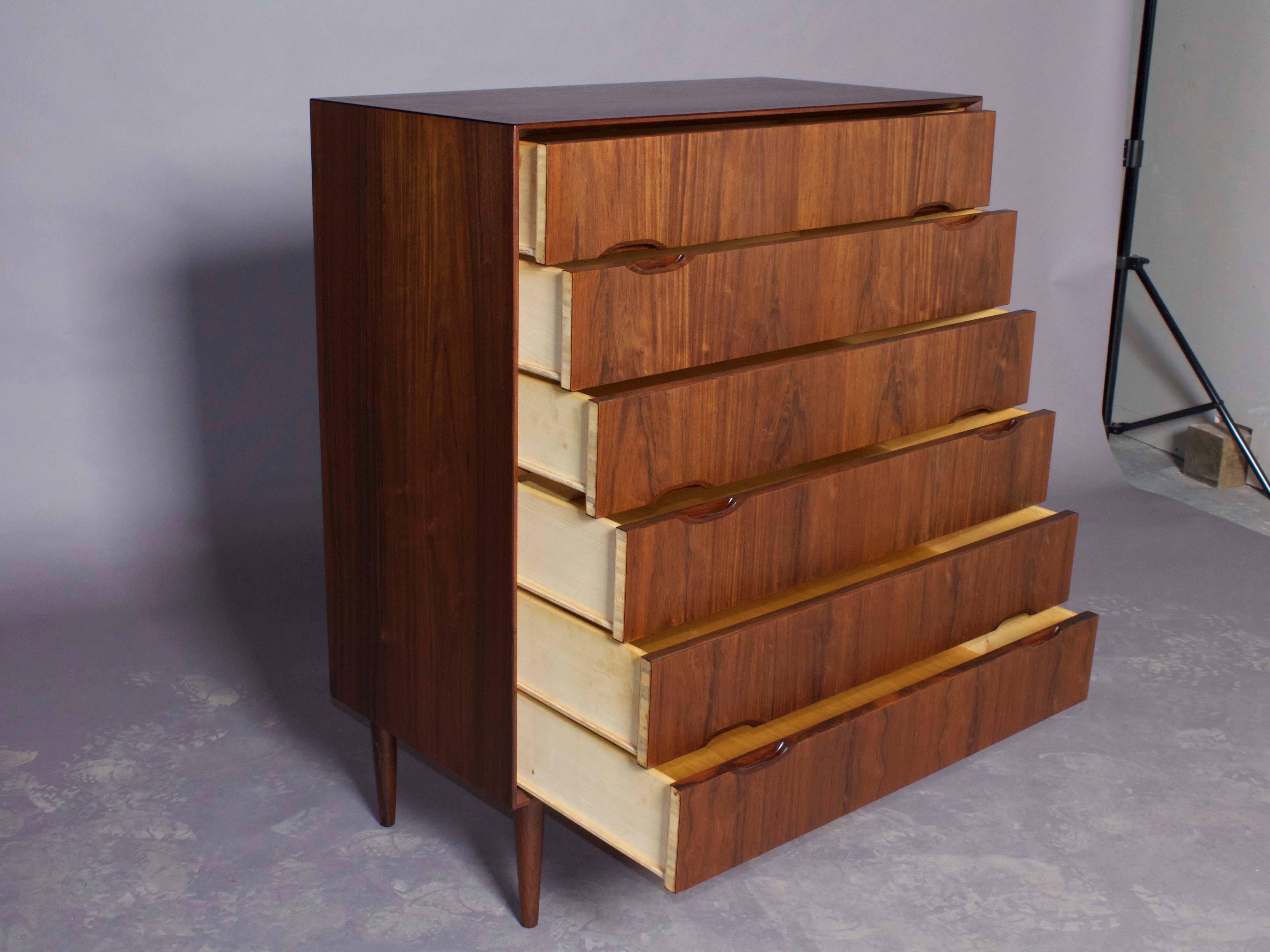 Vintage 1960s rosewood chest of drawers. 

This Danish dresser is in like new condition. Of coarse great for clothing storage in the bedroom but great storage for linens as well. Six drawers. Ready for pick up, delivery, or shipping anywhere in