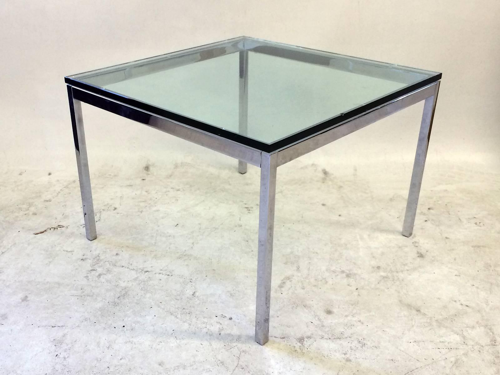This glass top side table in chromed steel by Florence Knoll for Knoll retains its label Knoll.
