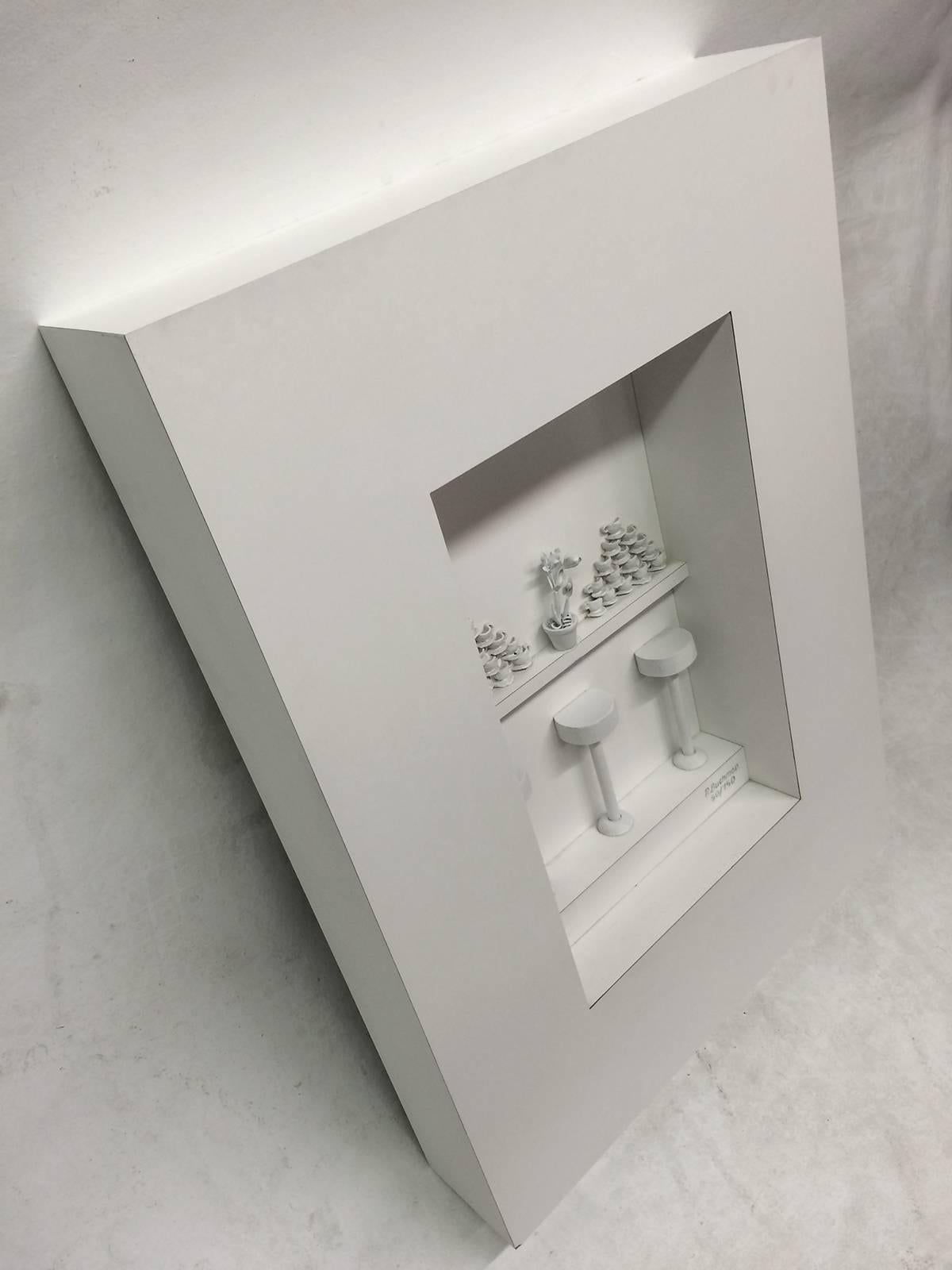 Three-dimensional wall sculpture in Formica, wood and clay with the stamp of 