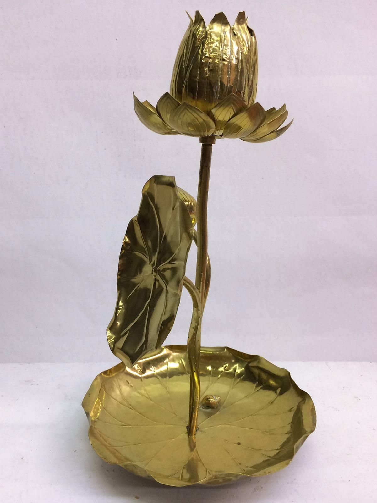 This table sculpture/lamp of an aquatic lily pad scene was produced by Feldman Co of Los Angeles during the 1960s. 
I like it better as a sculpture but it was originally a lamp (see pictures) and it can be electrified very easily. (We can do it.).