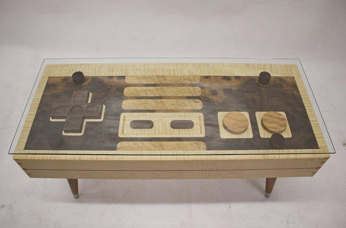 A fine example of craftsmanship, this beautifully made coffee table is composed of several types of rare wood and a lifted glass overlay. It features aluminum capped legs and dovetail finishing. The individual components of the 