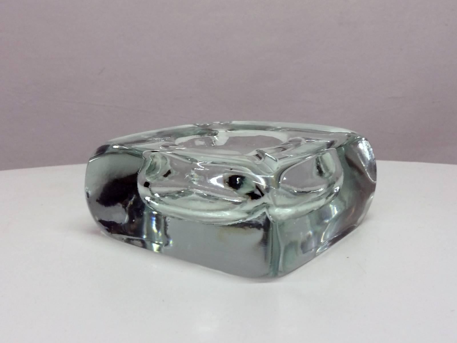 Square shaped, clear Murano glass ashtray made in Italy. Glass is very thick and heavy, can also be used as a catchall or paperweight!