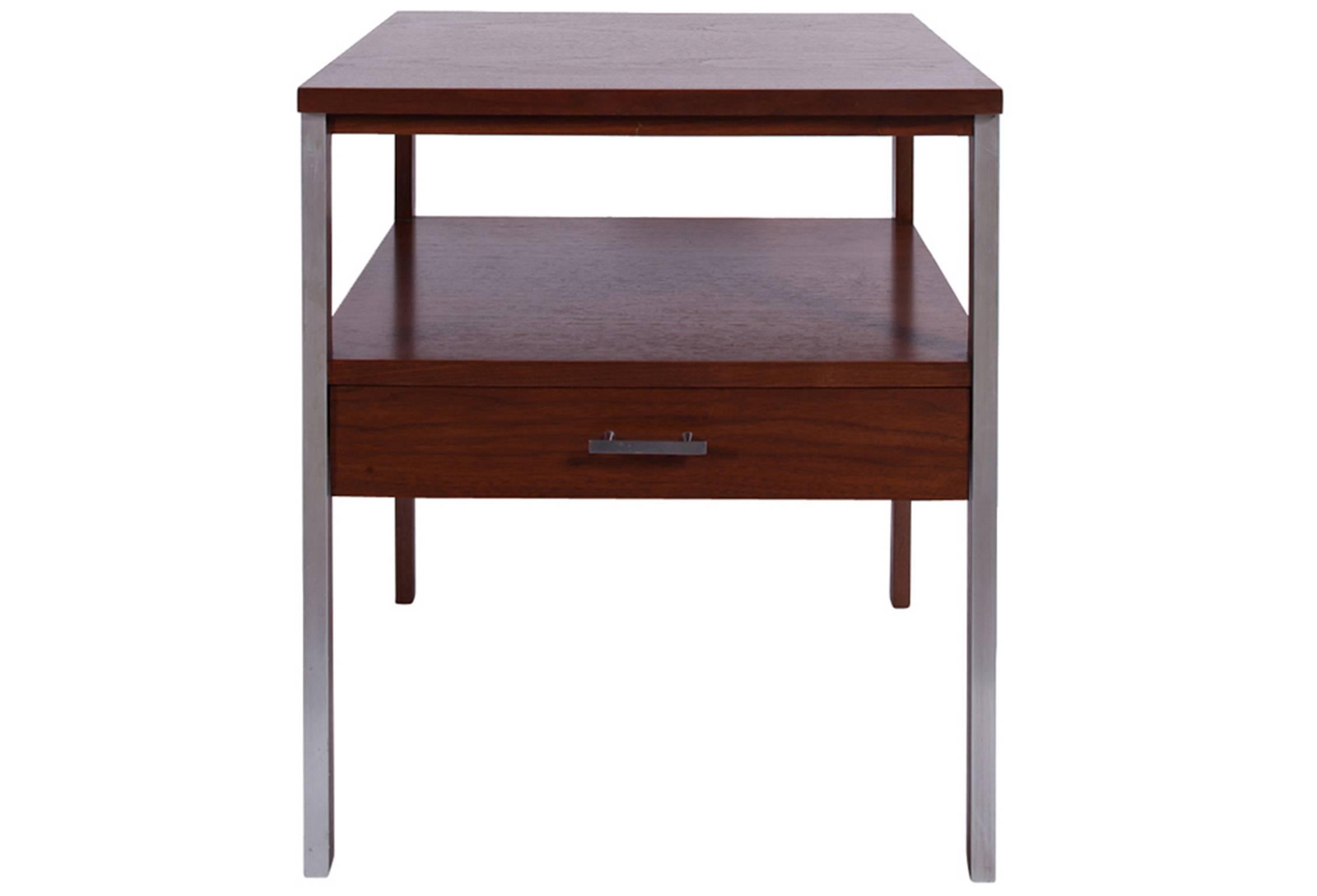 Walnut and brushed steel side table by Paul McCobb for Calvin Grand Rapids.
The back has the same finish than the front.