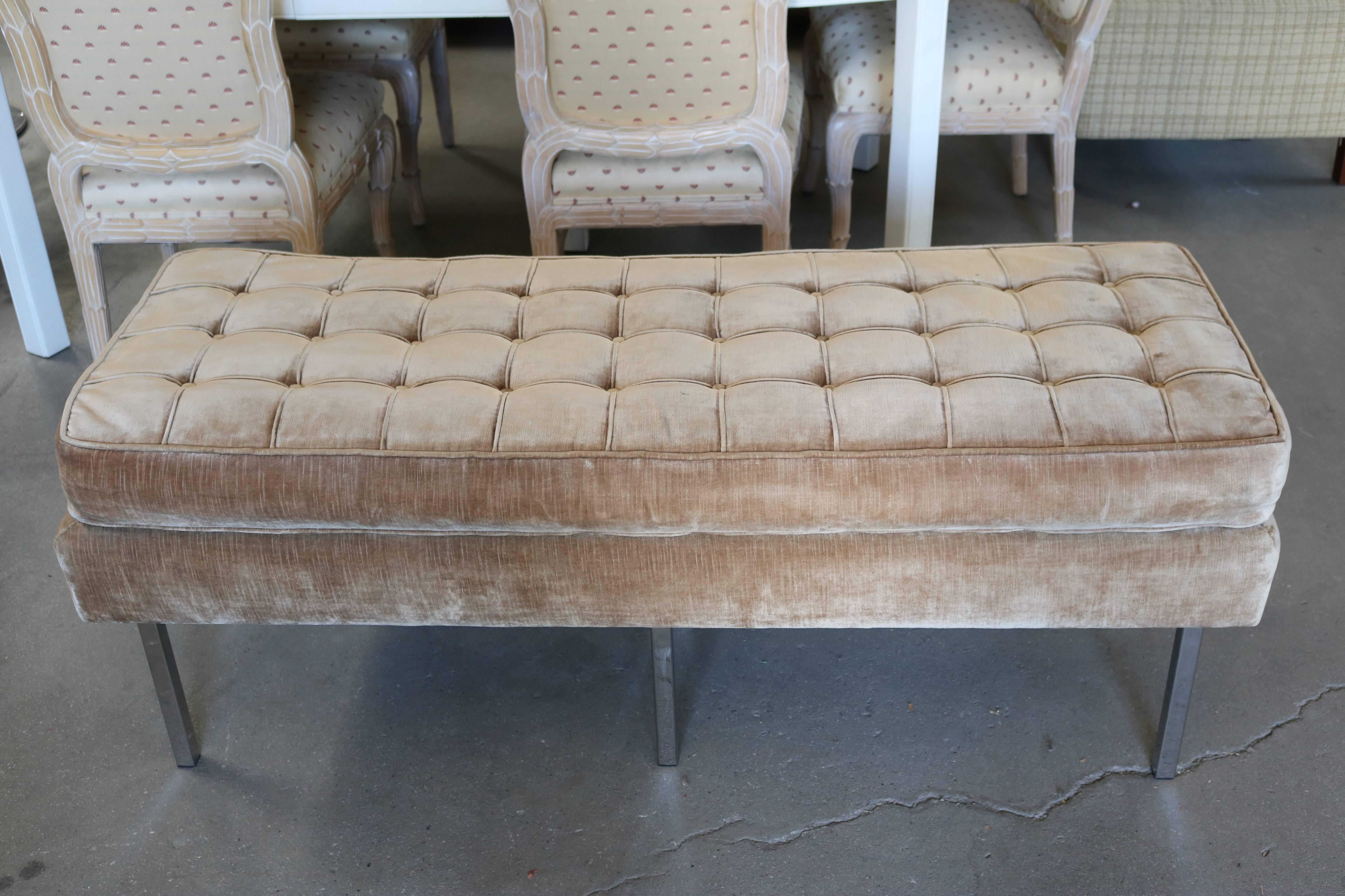 Bench seat with chrome legs and sand colored velvet chenille upholstery. Tufted cushion is fully removable.