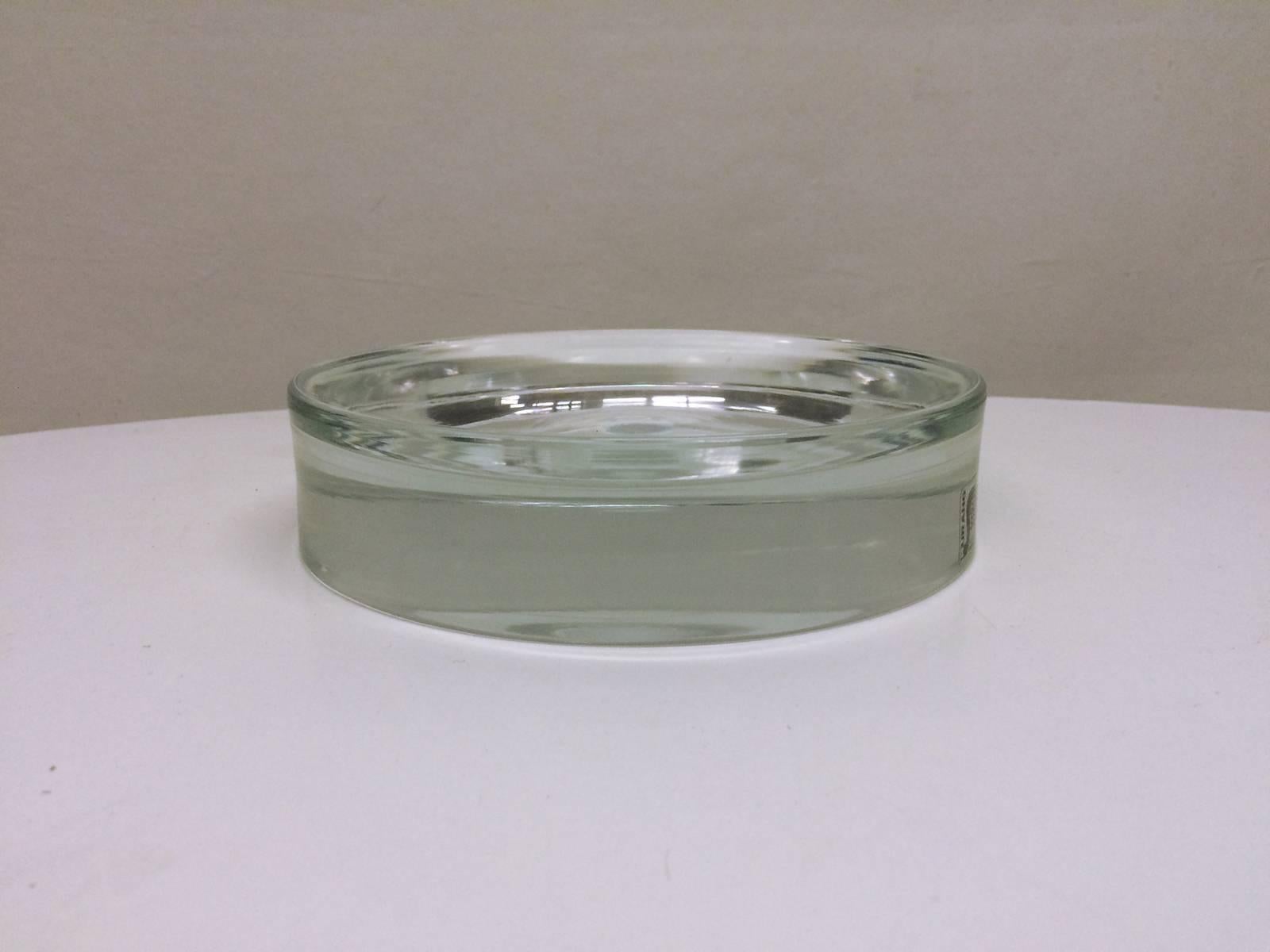 Clear Murano glass catchall or ashtray; can also be used as a stand or base for sculpture or other artwork. Has a Seguso Murano sticker on side.