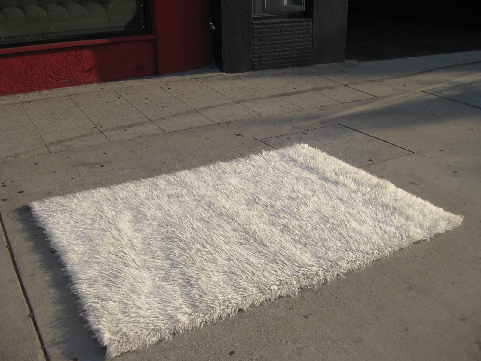 5/7 feet vintage white high pile Shag wool rug.