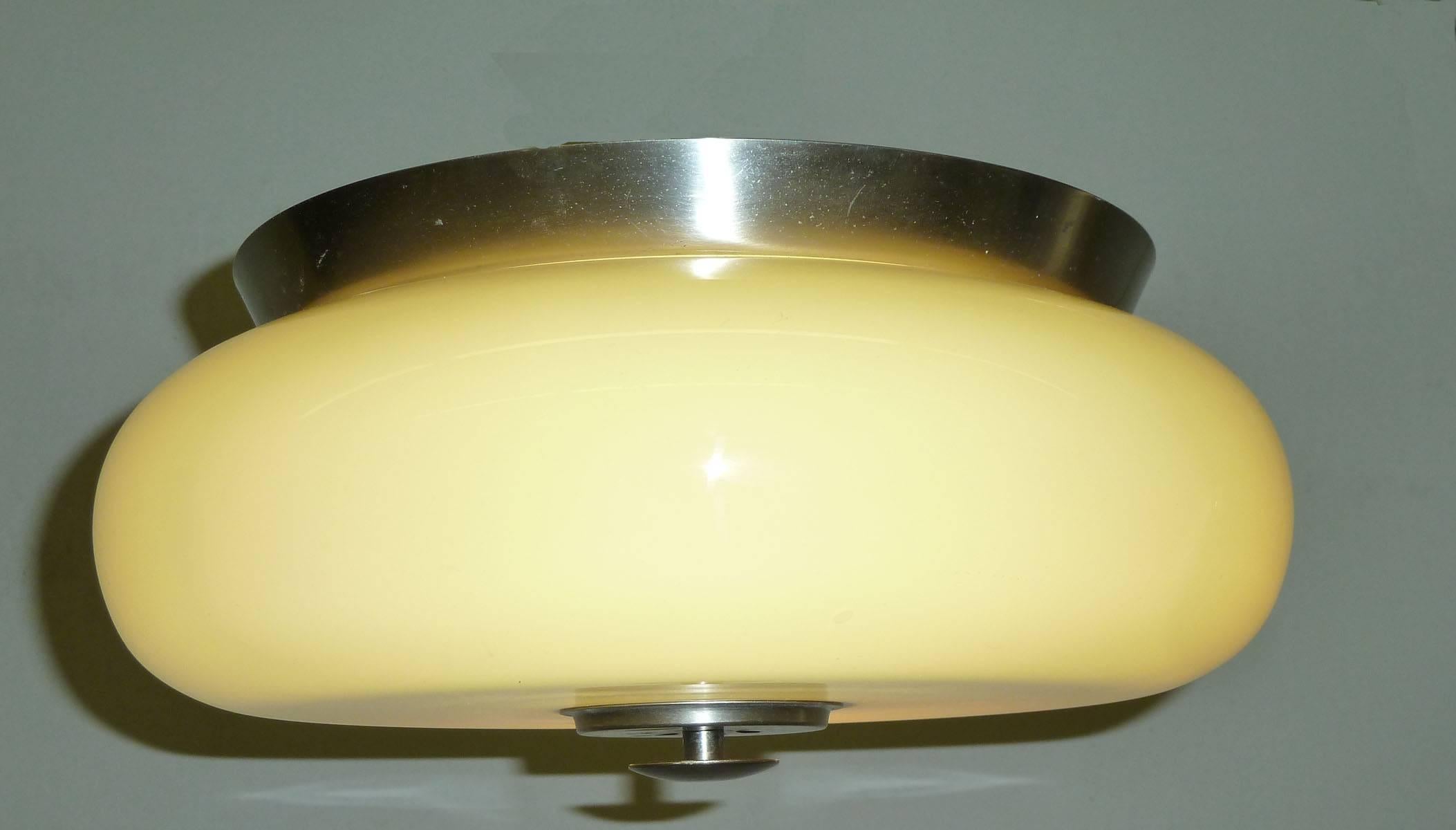 Yellow Murano glass flush mount light fixture.
It gives a beautiful warm light.