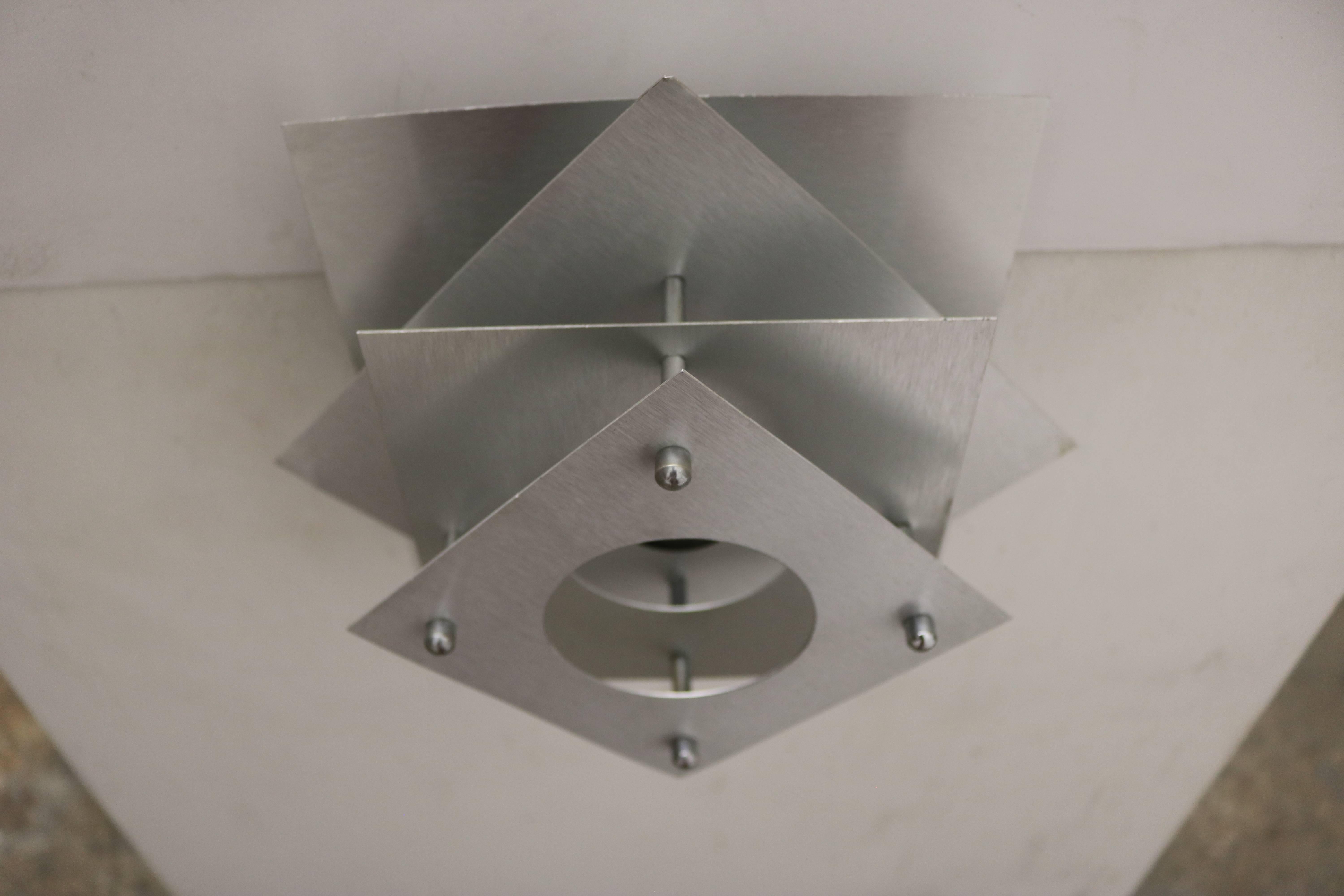 French, 1970s Space Age Brushed Steel Wall Sconce In Excellent Condition In Pasadena, CA