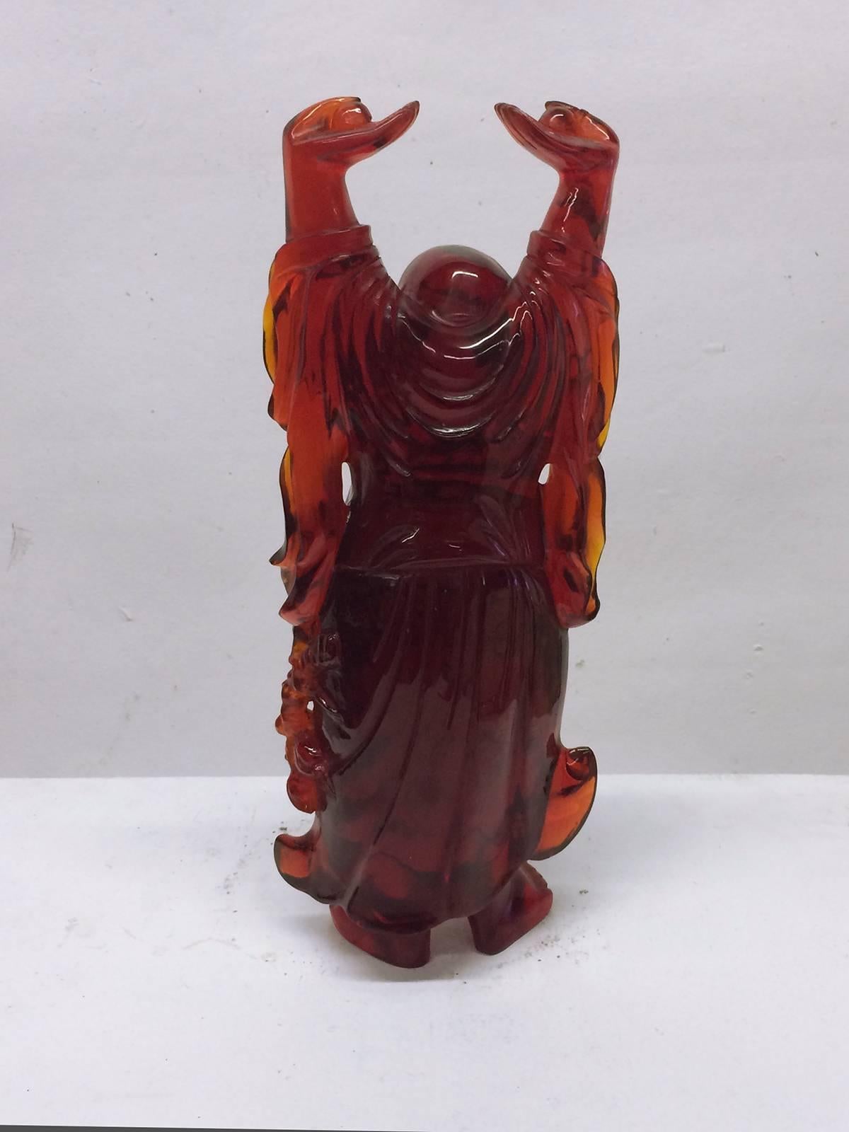 red resin buddha