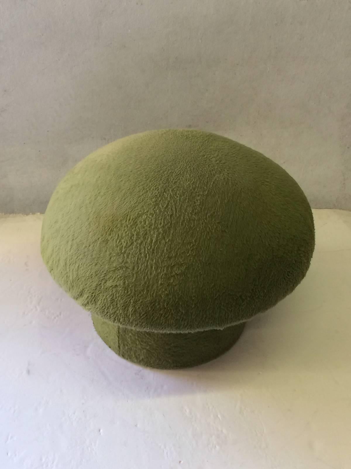 Funky fleece covered ottoman in green.  This piece is at once both playful and comfy.  