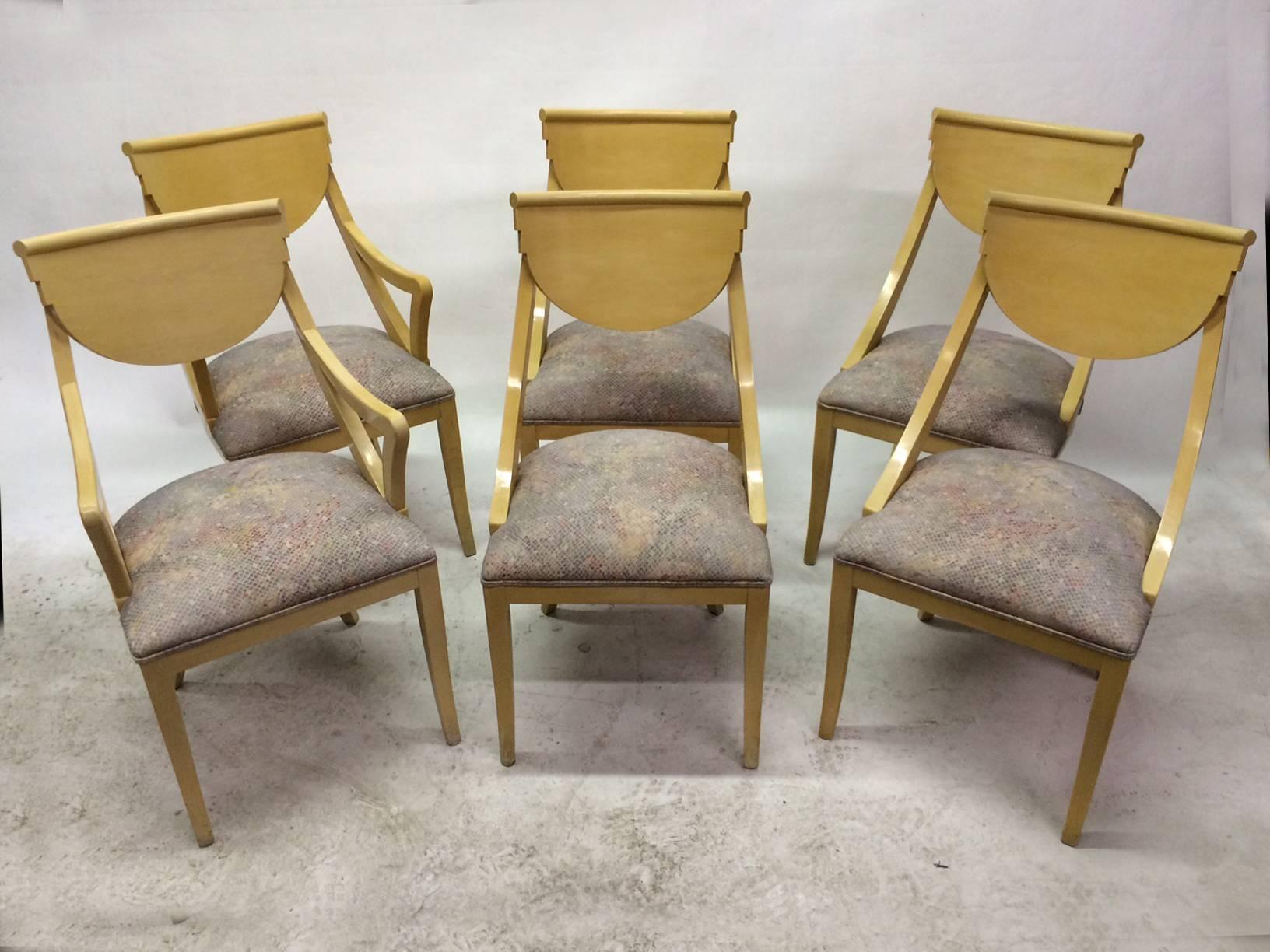 Set of two captain and four dining chairs with their original cream lacquer finish and original fabric. Very well crafted. Note the back details. They are very sturdy and very comfortable with their gondola shape.