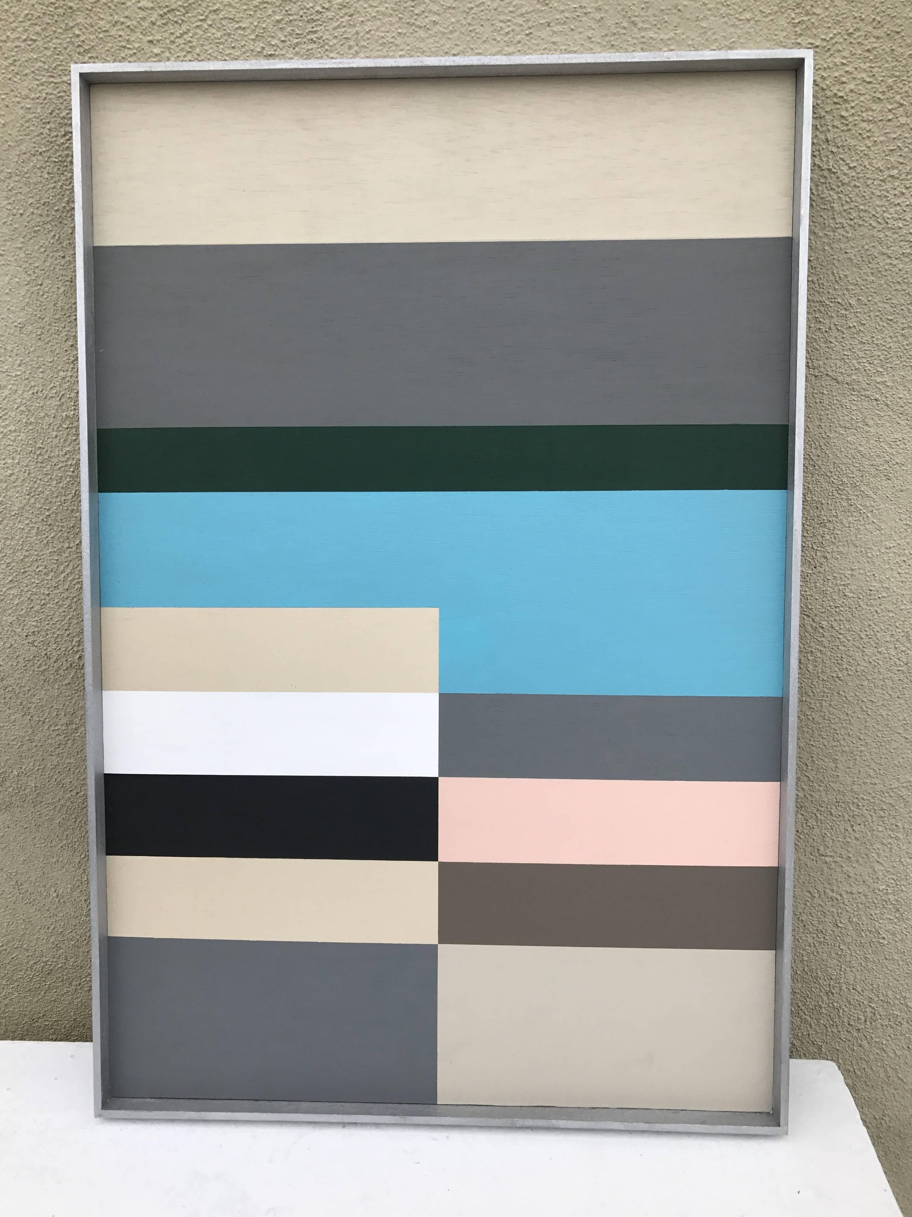 Color block hard edge painting in neutral tones with blue and pink.
It sits in a Minimalist silvered wood frame.