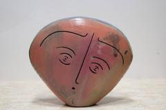 Minimalist Ceramic Sculpture of a Head with Two Faces