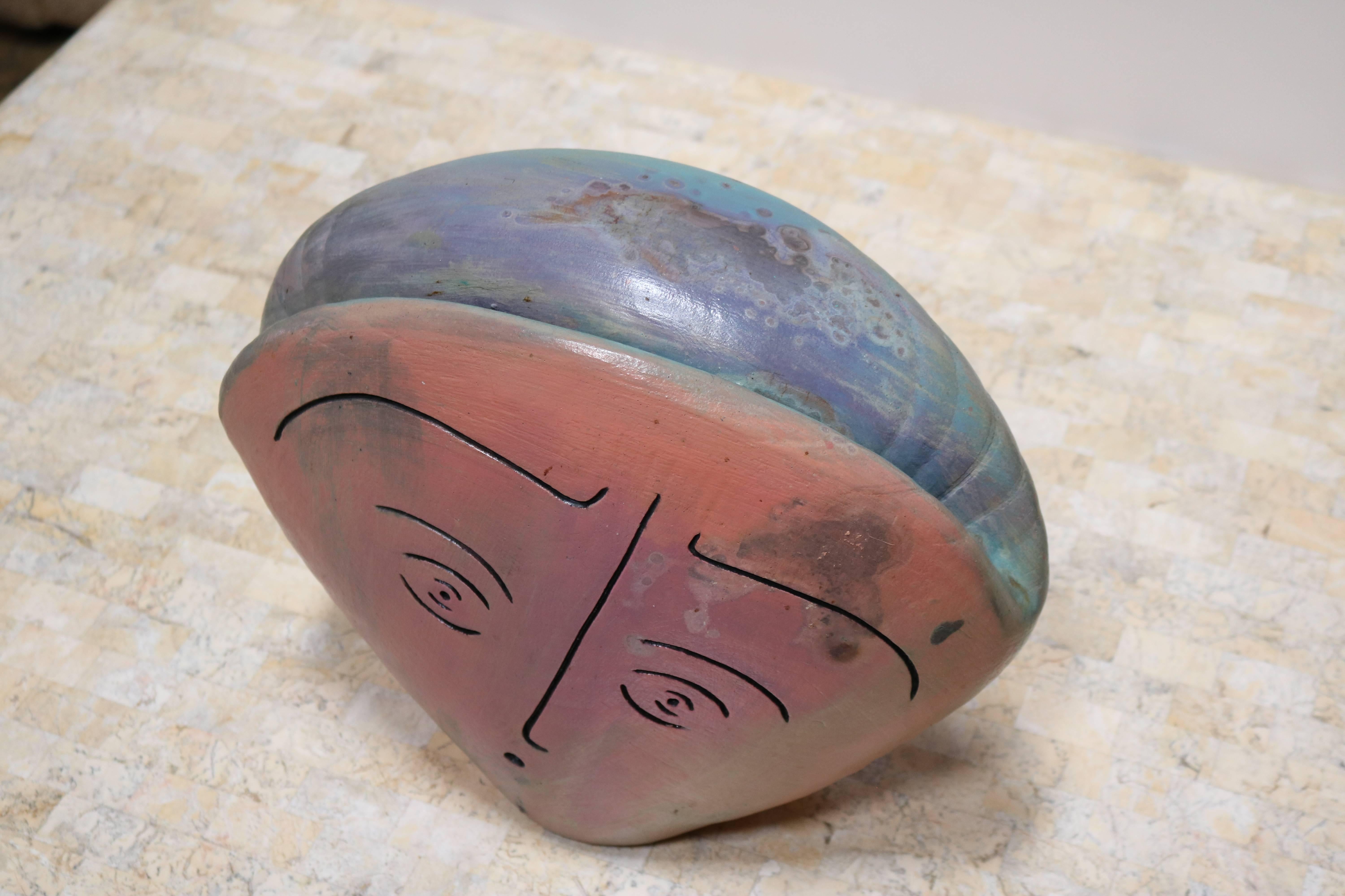 Minimalist Ceramic Sculpture of a Head with Two Faces 1