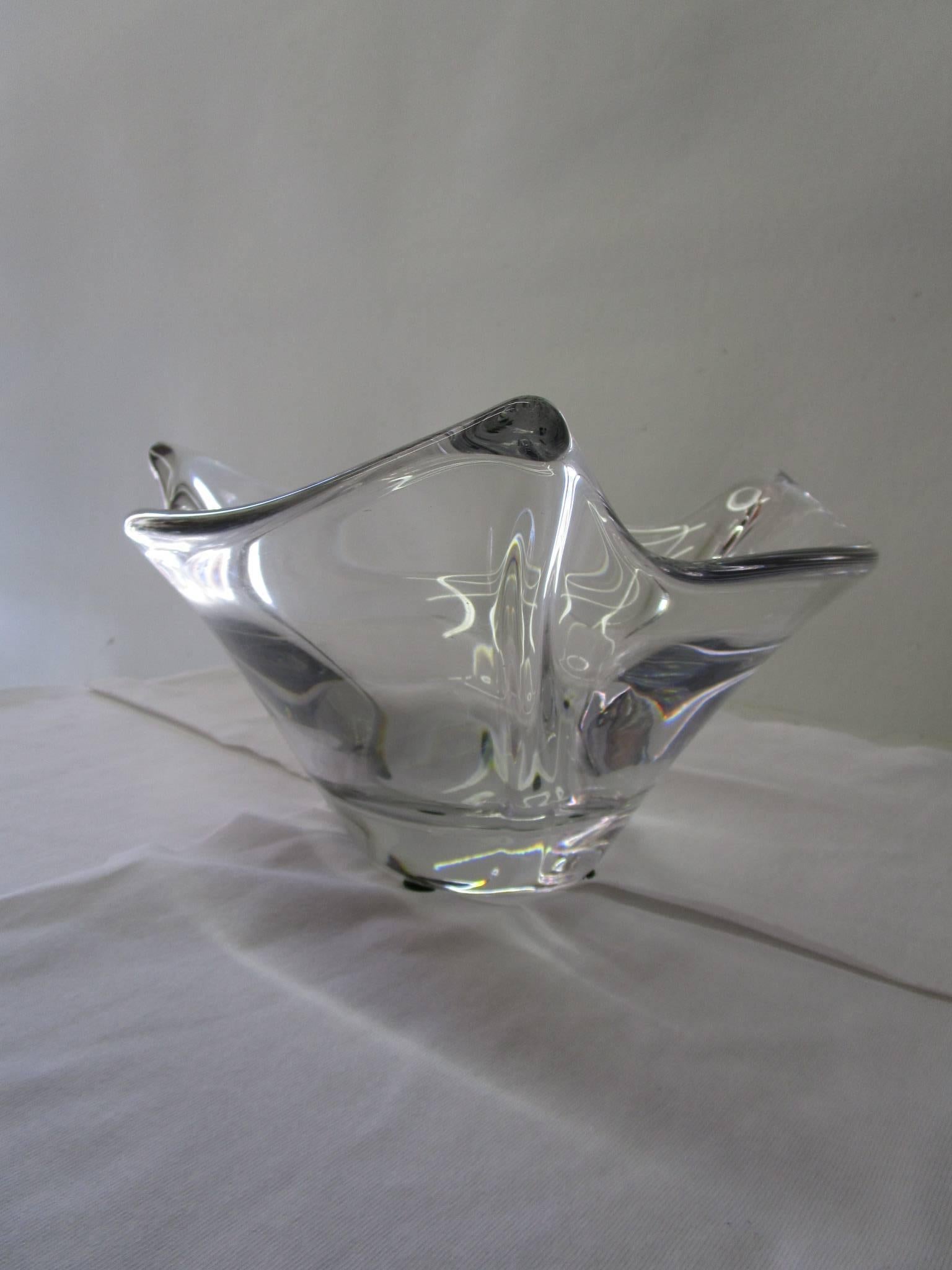 This French crystal bowl has a unique triple peak design. It has an etched signature Daum France. The Daum crystal studio has been based in Nancy, France since the late 1800s.