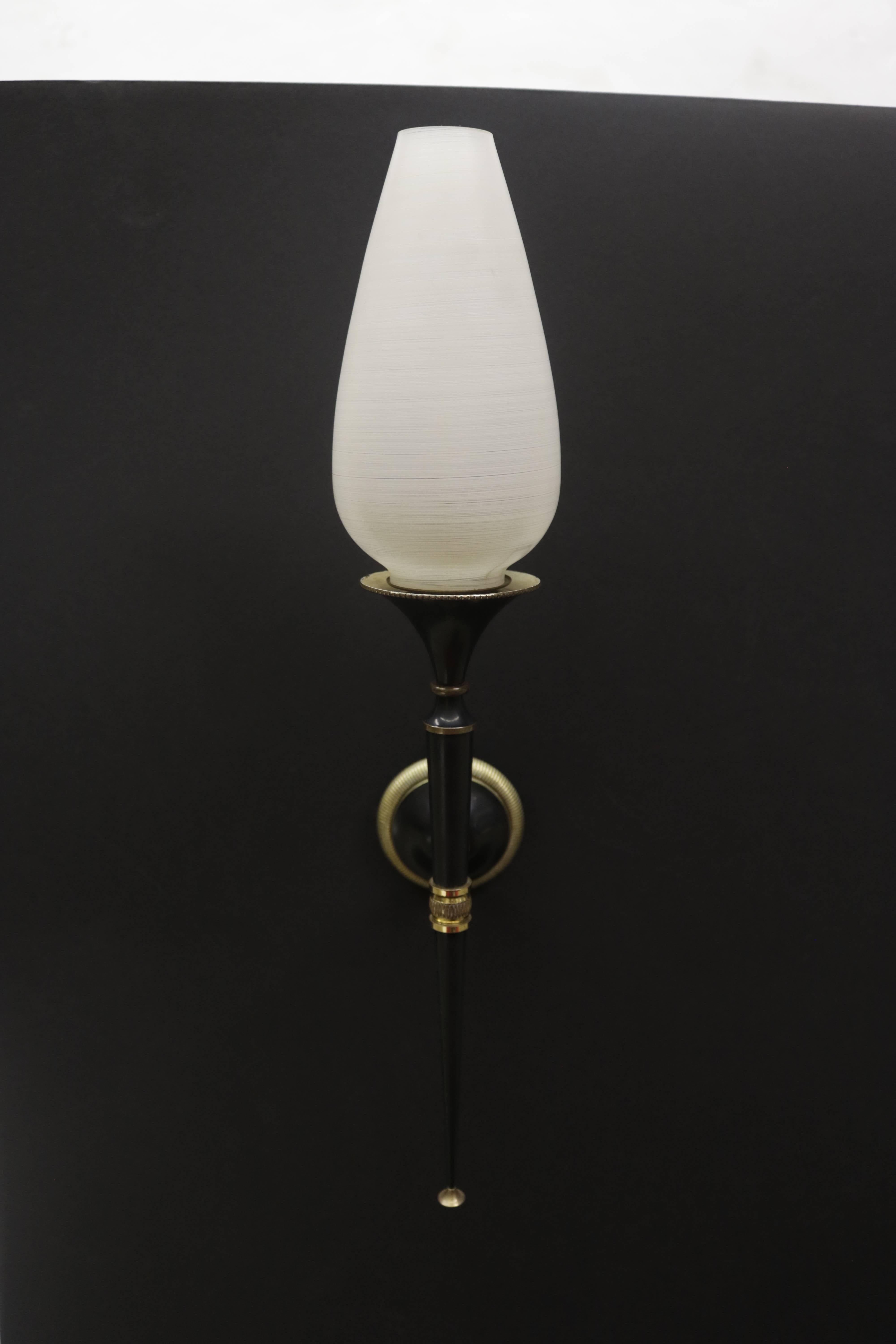 Single 1950s French sconce black metal and brass with a streaked frosted glass tulip shape shade.