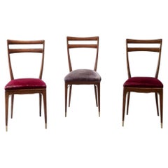 Huit chaises élégantes en noyer tourné, signées Guglielmo Ulrich