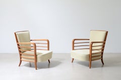1940's Pair of shaped cherrywood armchairs