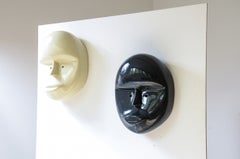 Pair of 1970's large fiberglass masks
