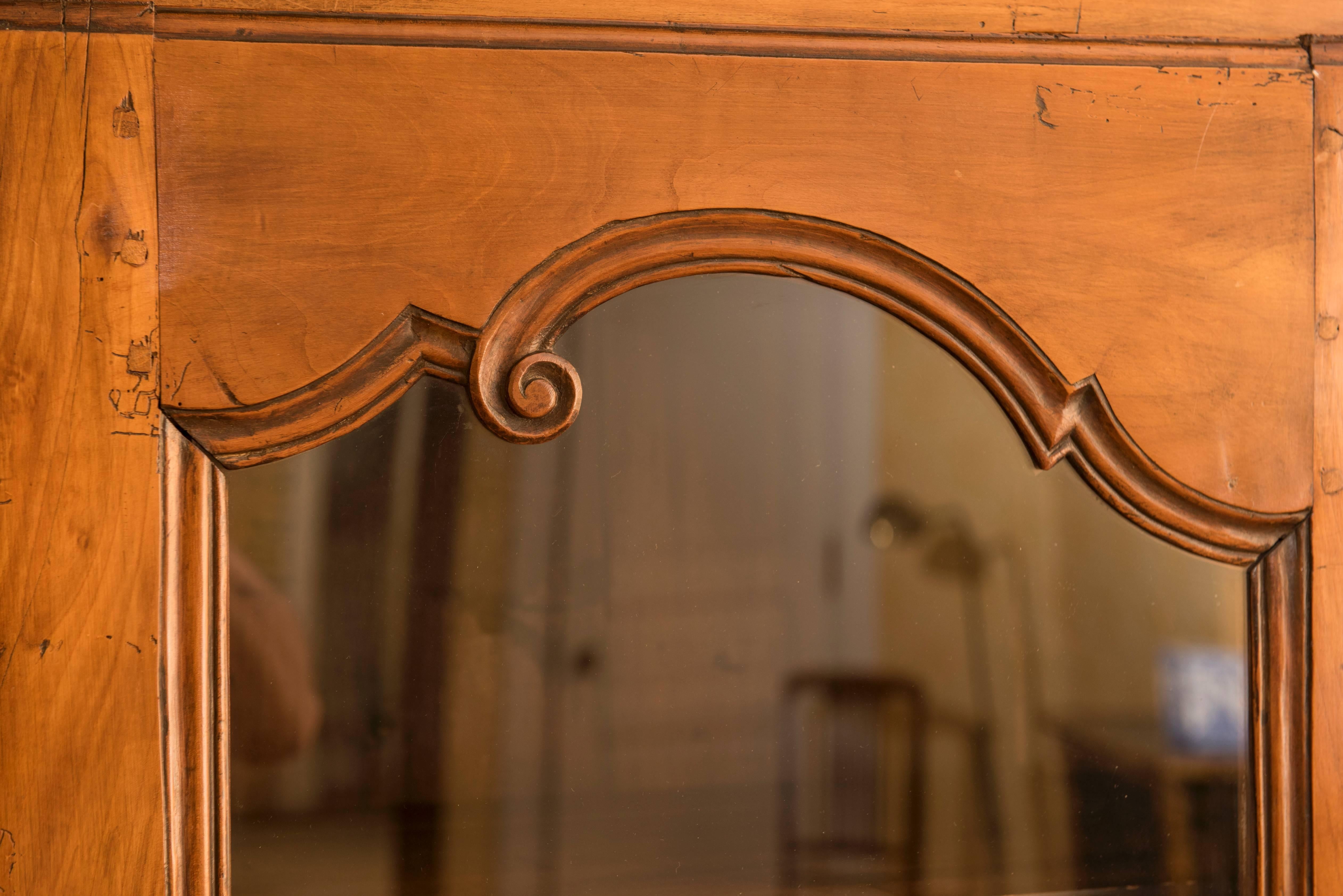 Beautifully carved walnut detailing.