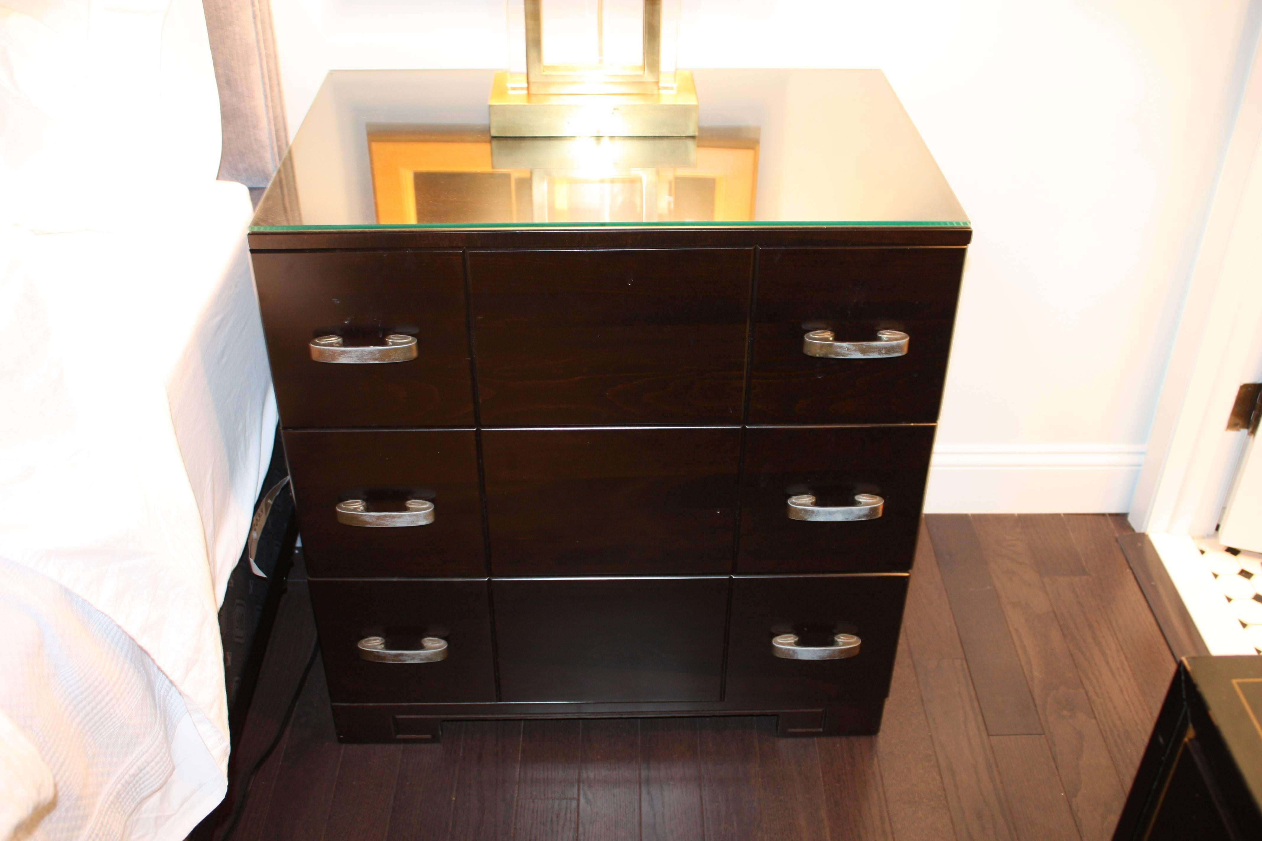 Scroll metal handles, dark brown ebonized walnut, beautiful drawer construction, glass top for protection.