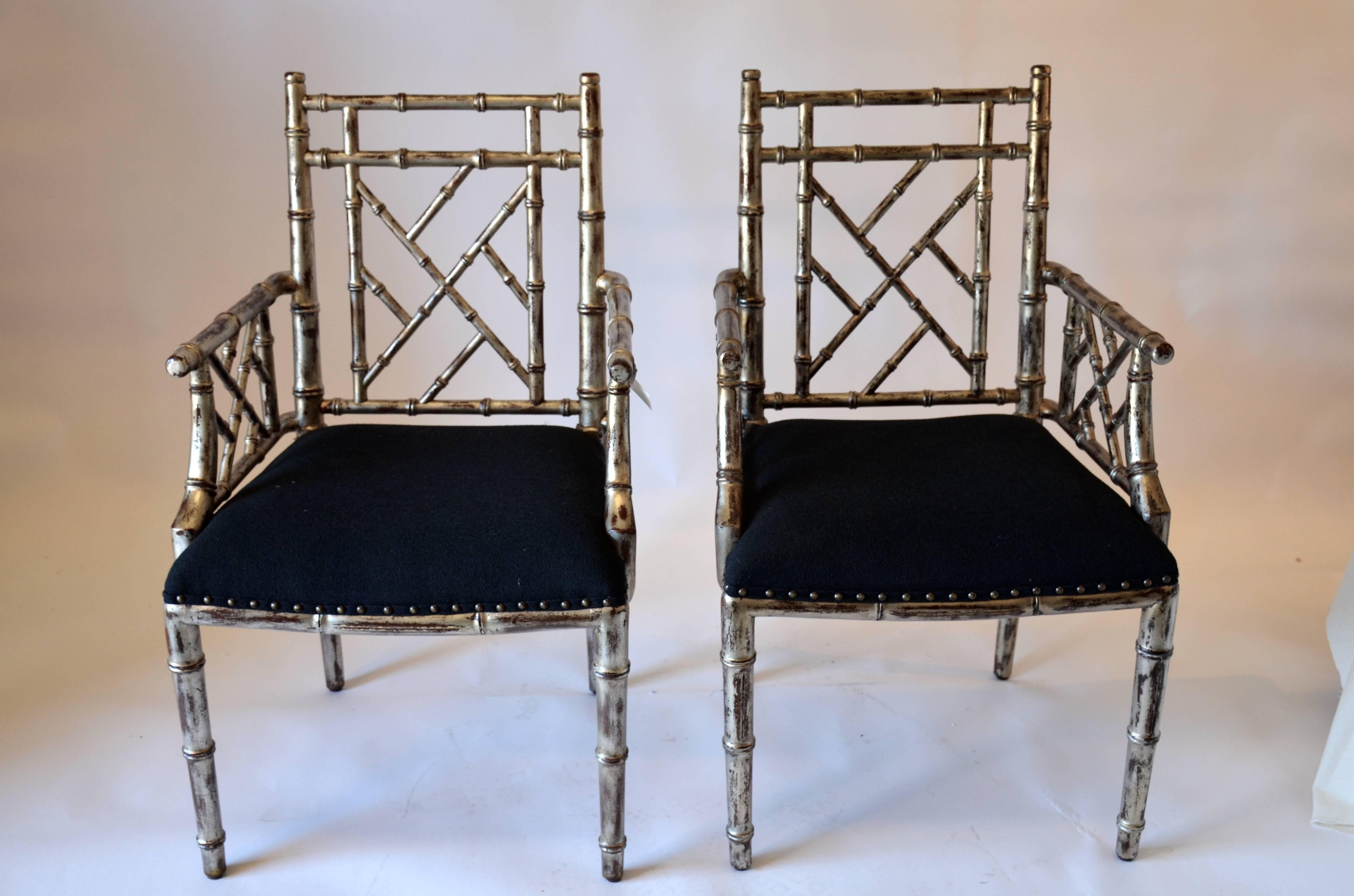 Available in two or four, rogue silver gilt chair with black upholstery 

$2350 per pair - please inquiry within about set of four.