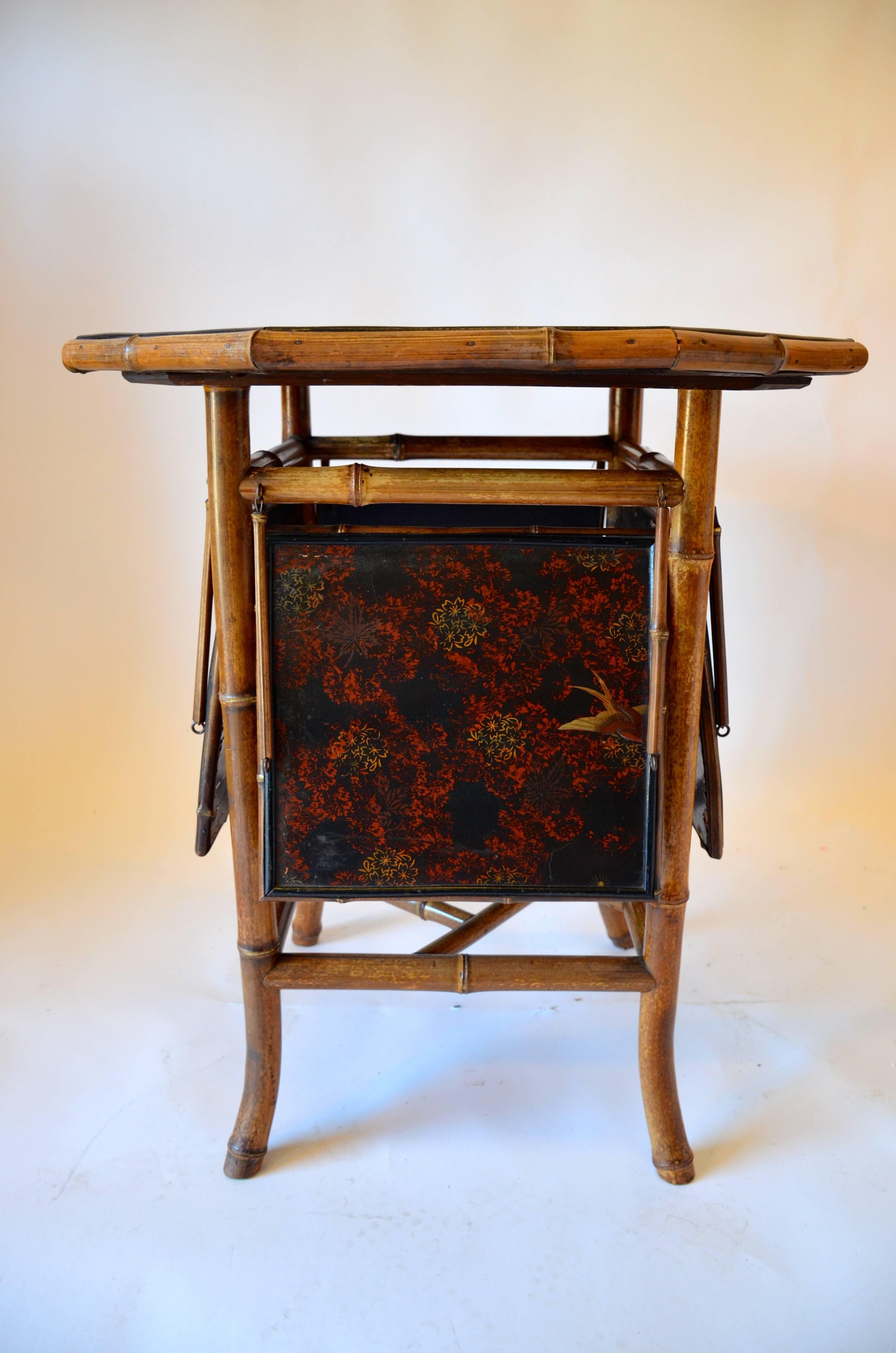 Multi-tiered, functional, beautifully detailed, English tea table. Four working flip up tiers are perfect for cocktails in a group setting. Measure: Large wingspan is 34 inches when open. Smallest is 25 inches when closed.